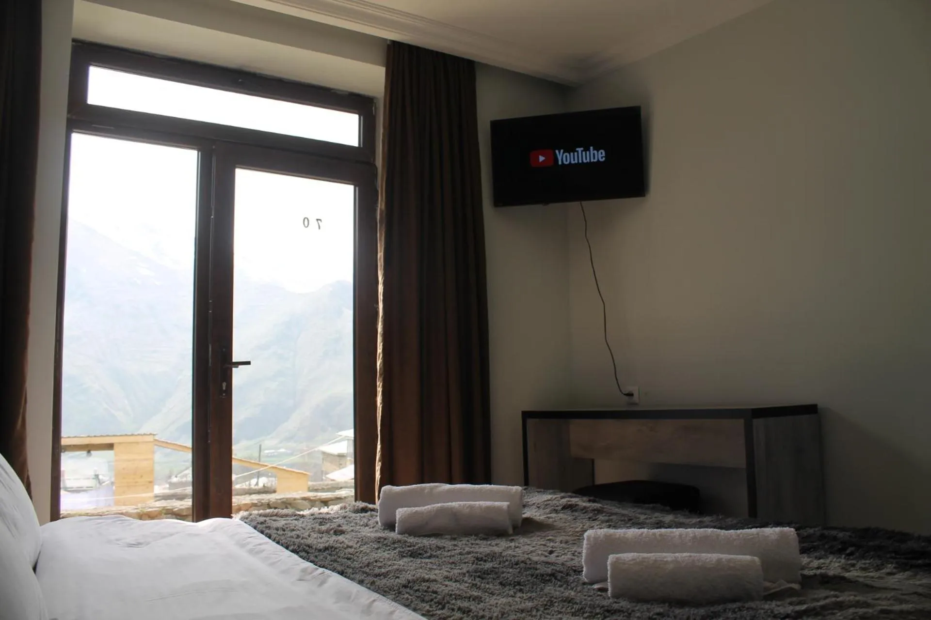 Bed in Hotel NOA Kazbegi