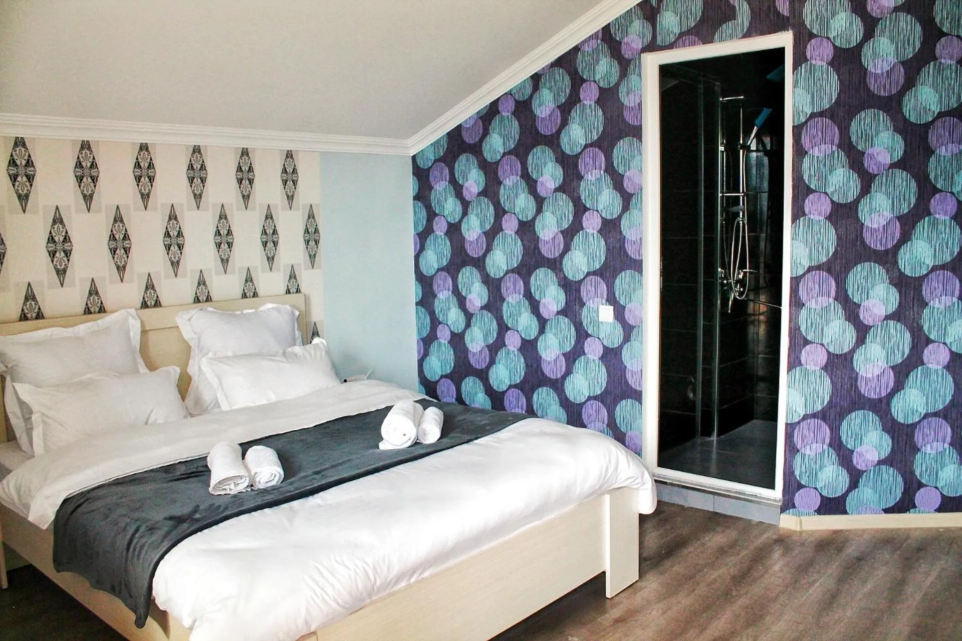 Bed in Hotel NOA Kazbegi