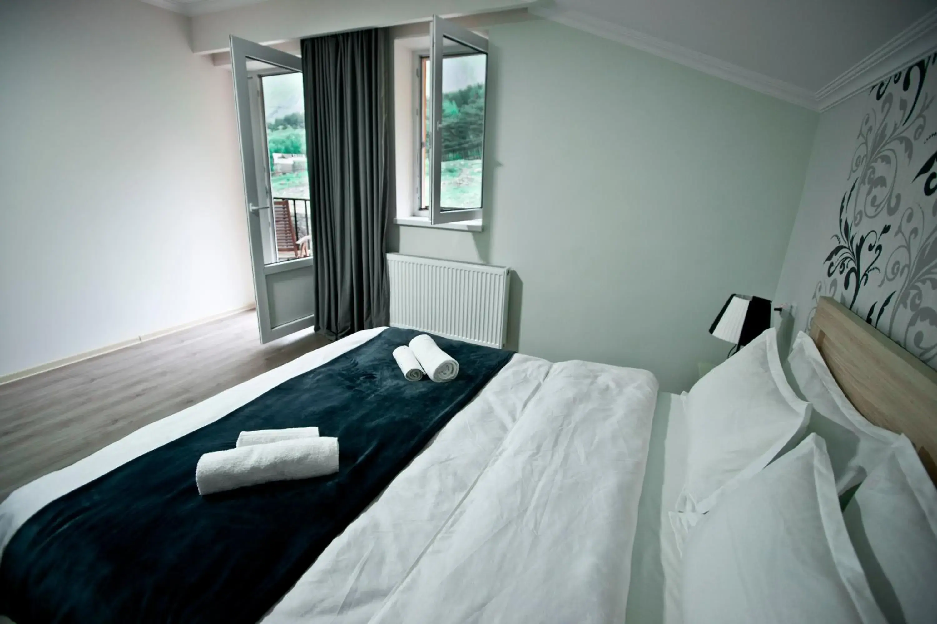 Double Room with Balcony in Hotel NOA Kazbegi Double Room with Balcony in Hotel NOA Kazbegi