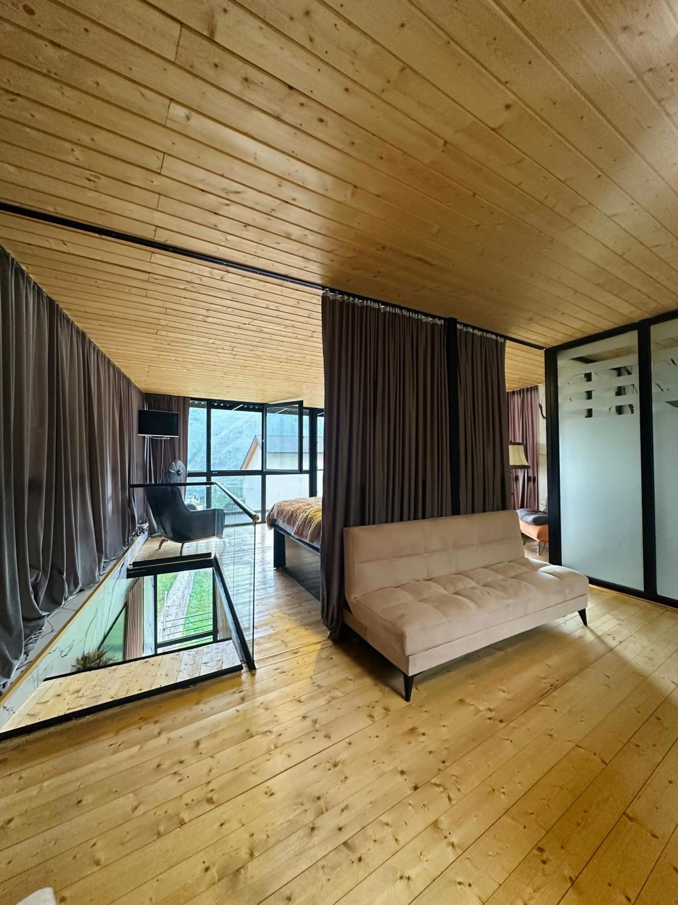 Bed in Hotel NOA Kazbegi