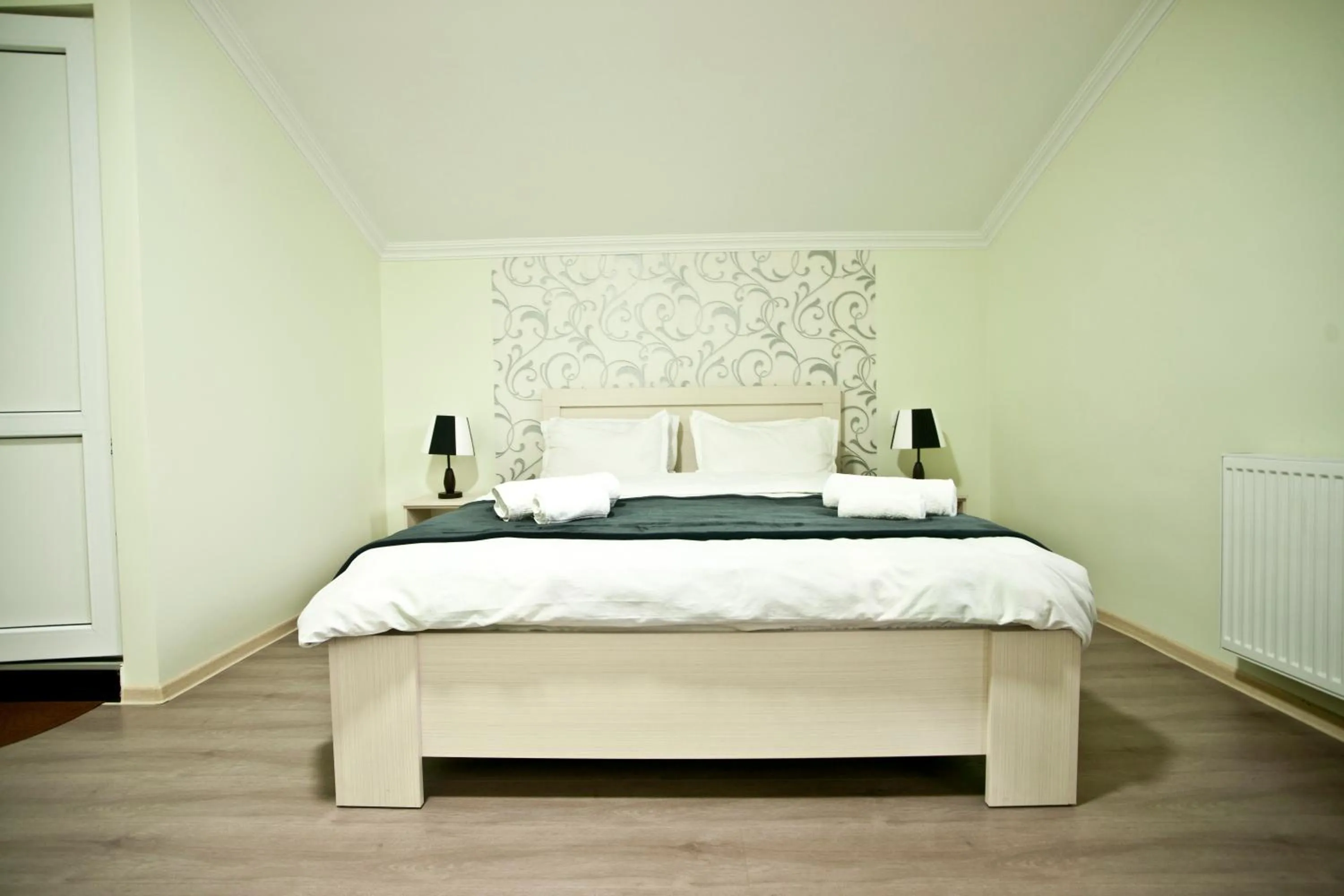 Bed in Hotel NOA Kazbegi