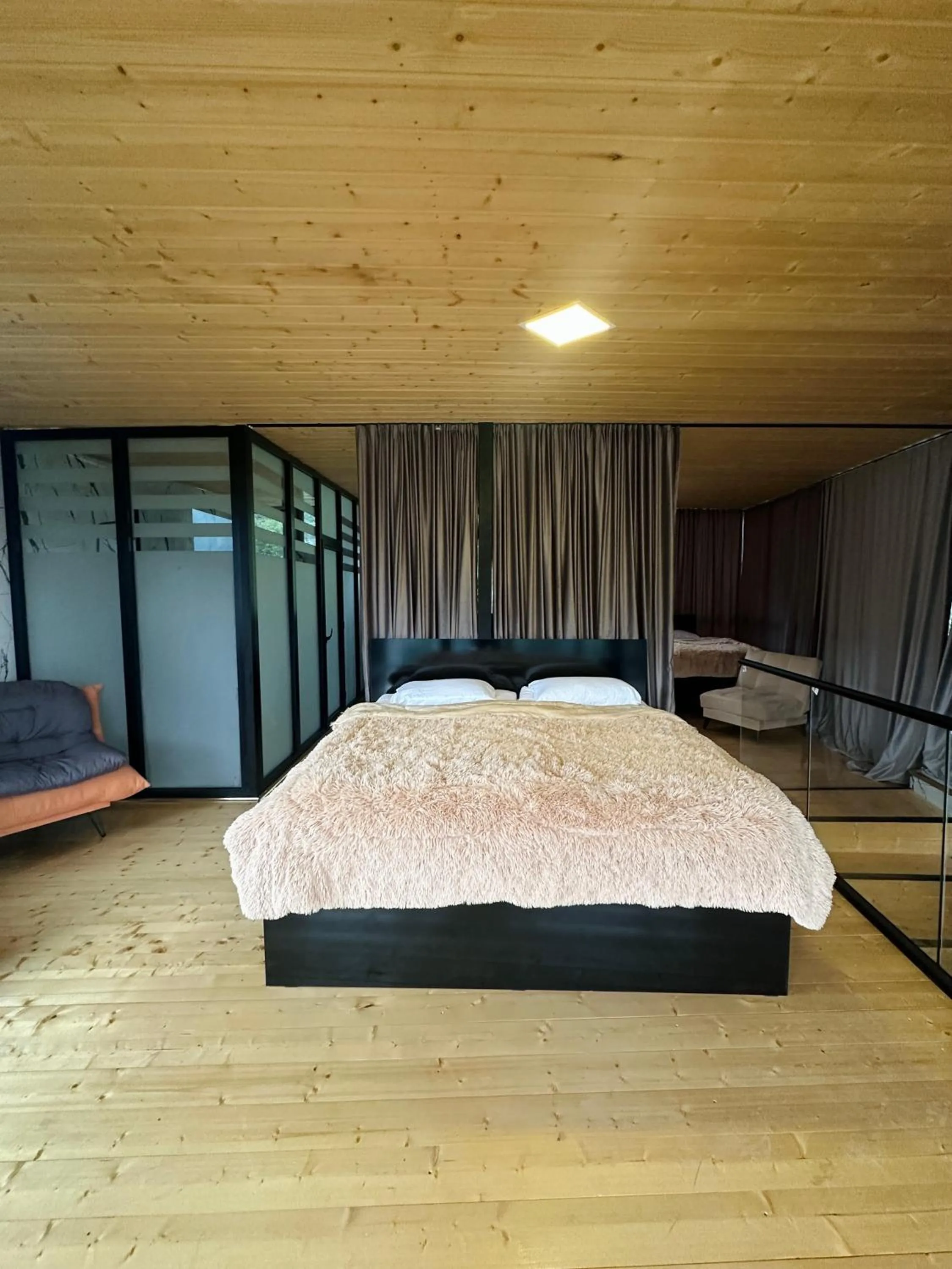 Bed in Hotel NOA Kazbegi