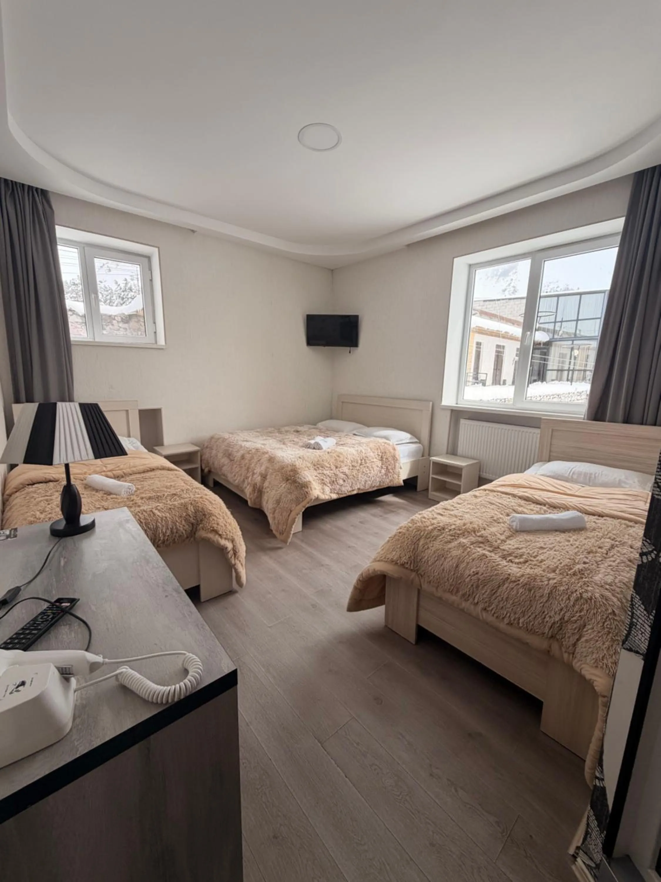 Bed in Hotel NOA Kazbegi