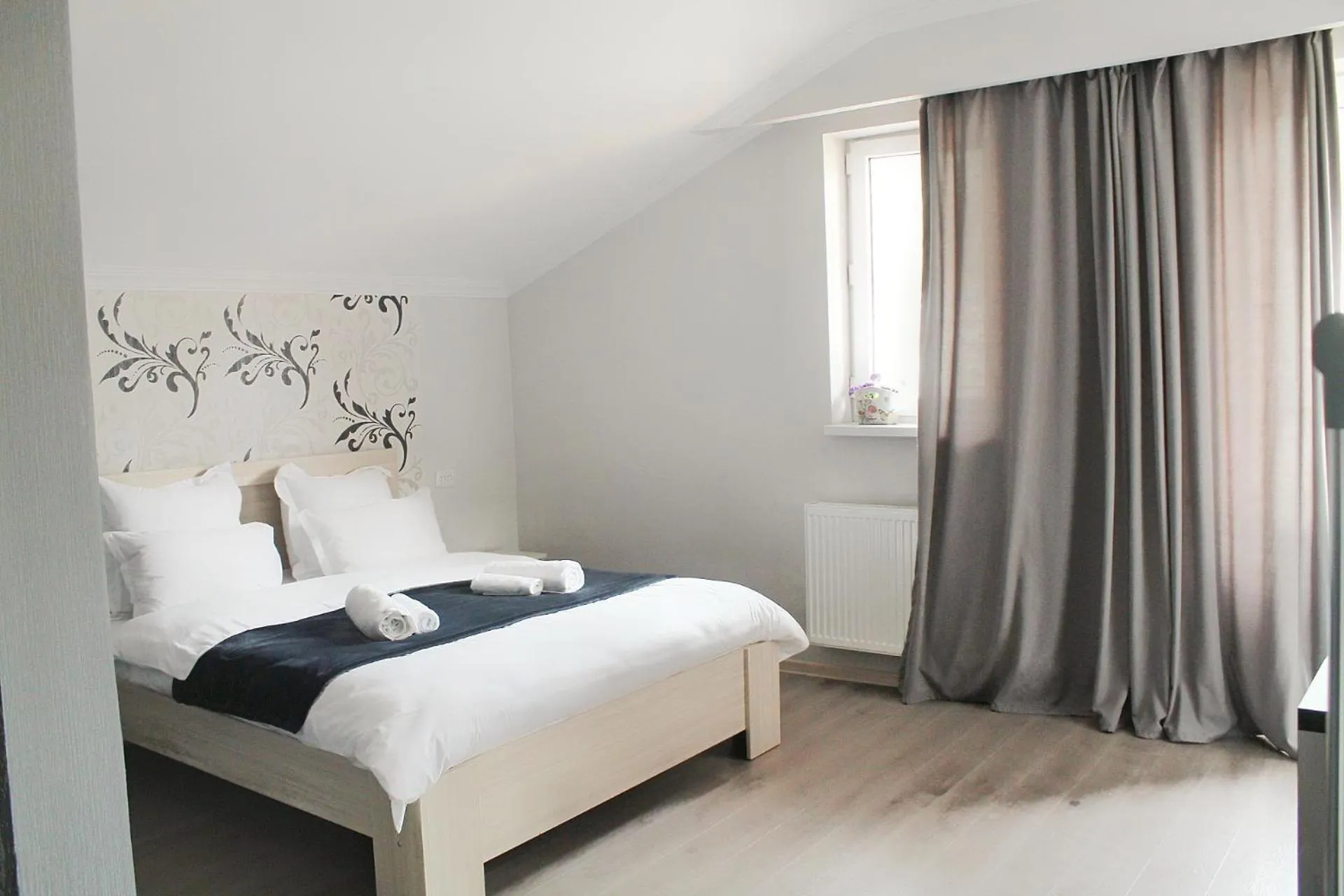 Bed in Hotel NOA Kazbegi