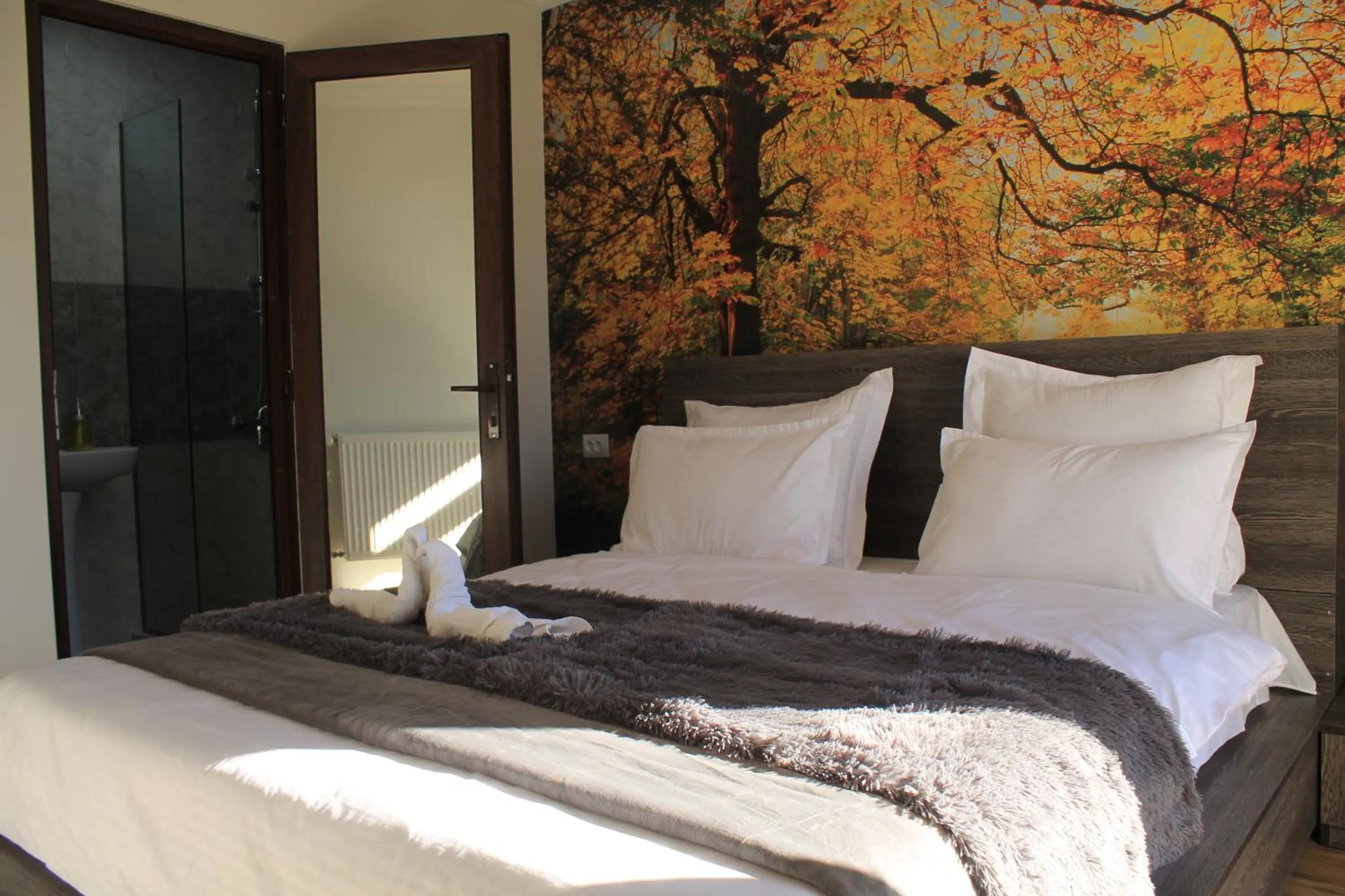 Bed in Hotel NOA Kazbegi