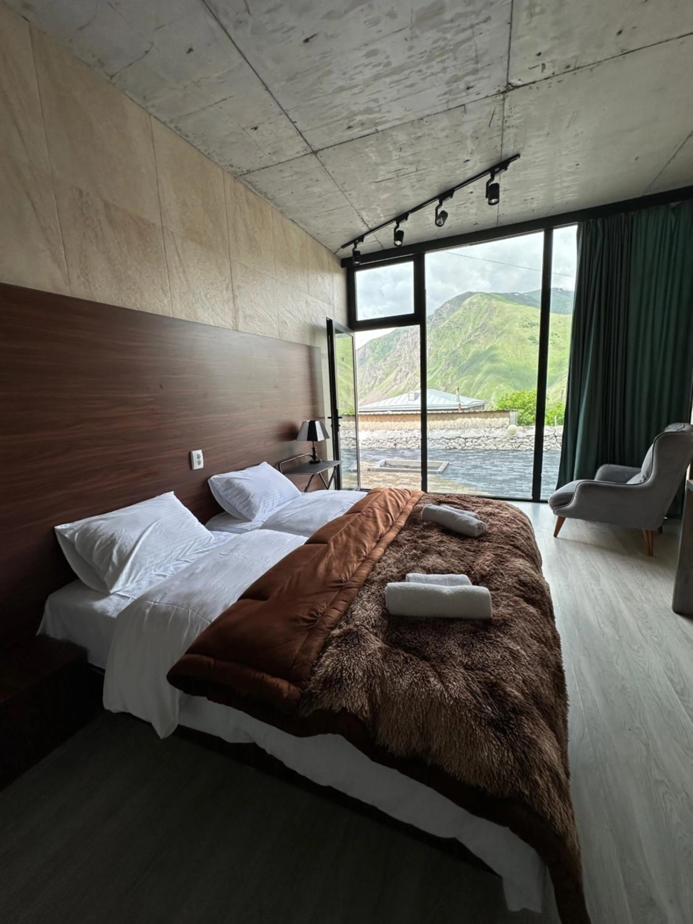 Bed in Hotel NOA Kazbegi