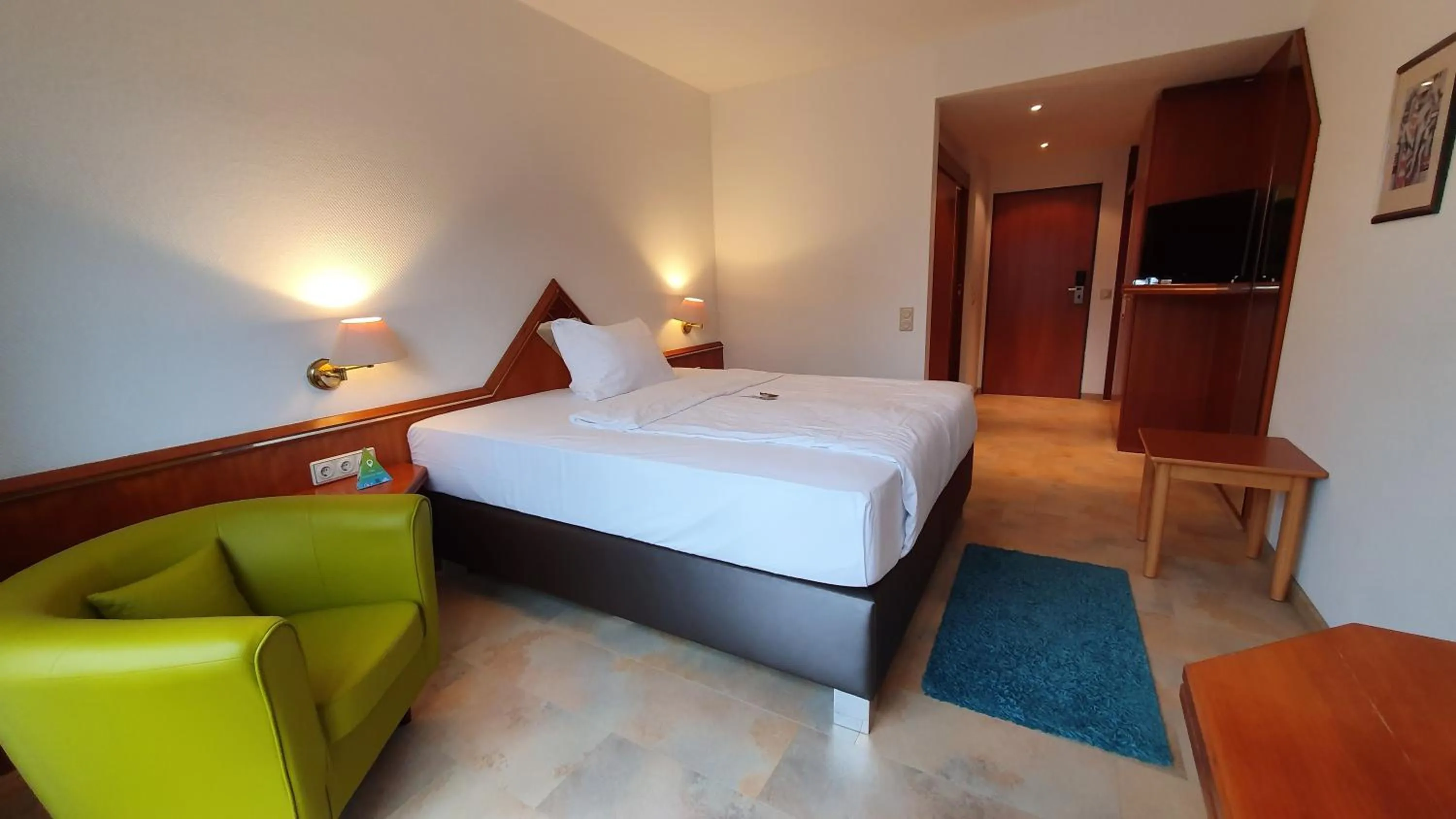 Photo of the whole room, Bed in AKZENT Hotel Merfelder Hof