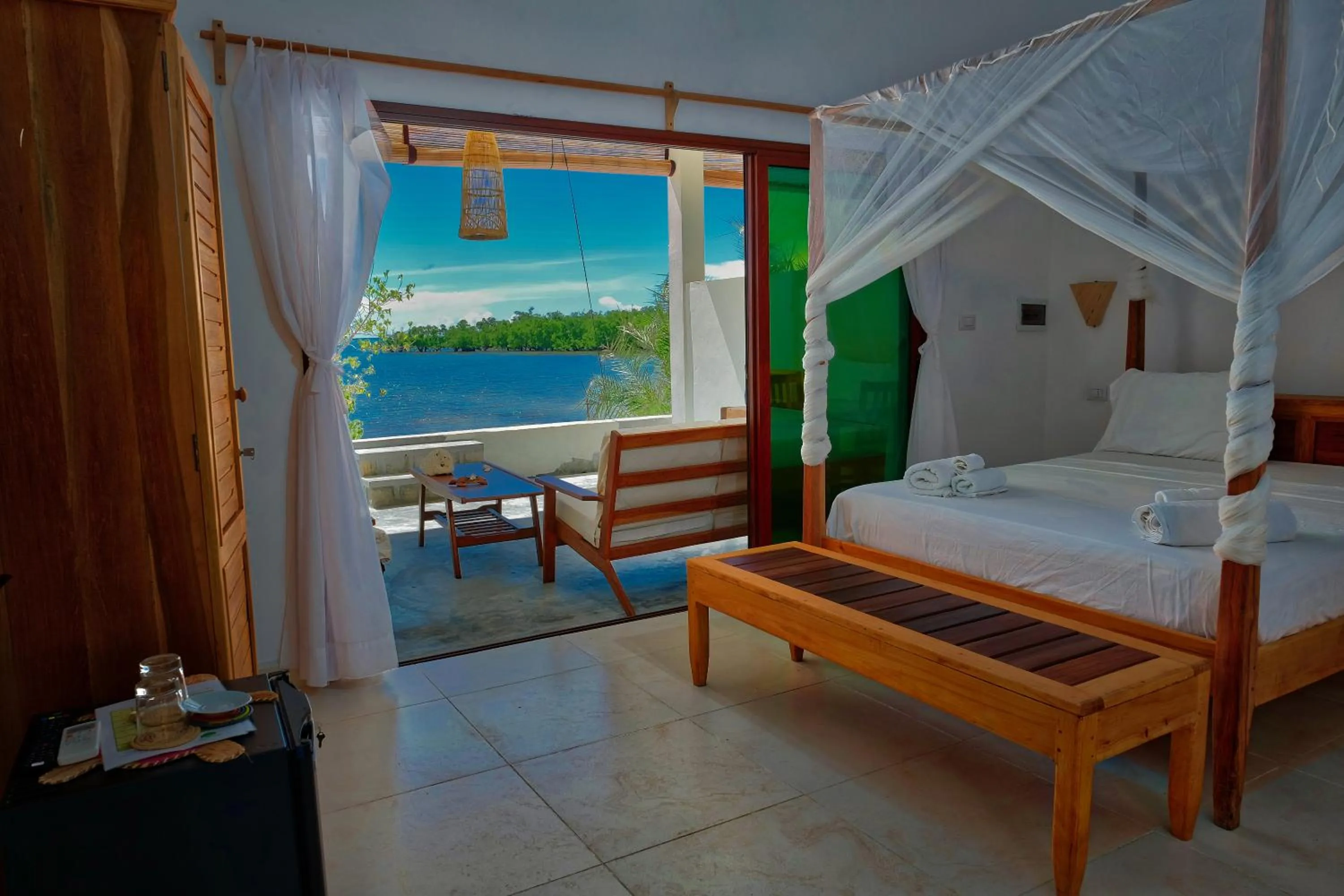 Photo of the whole room, Bed in Emeraude Lodge