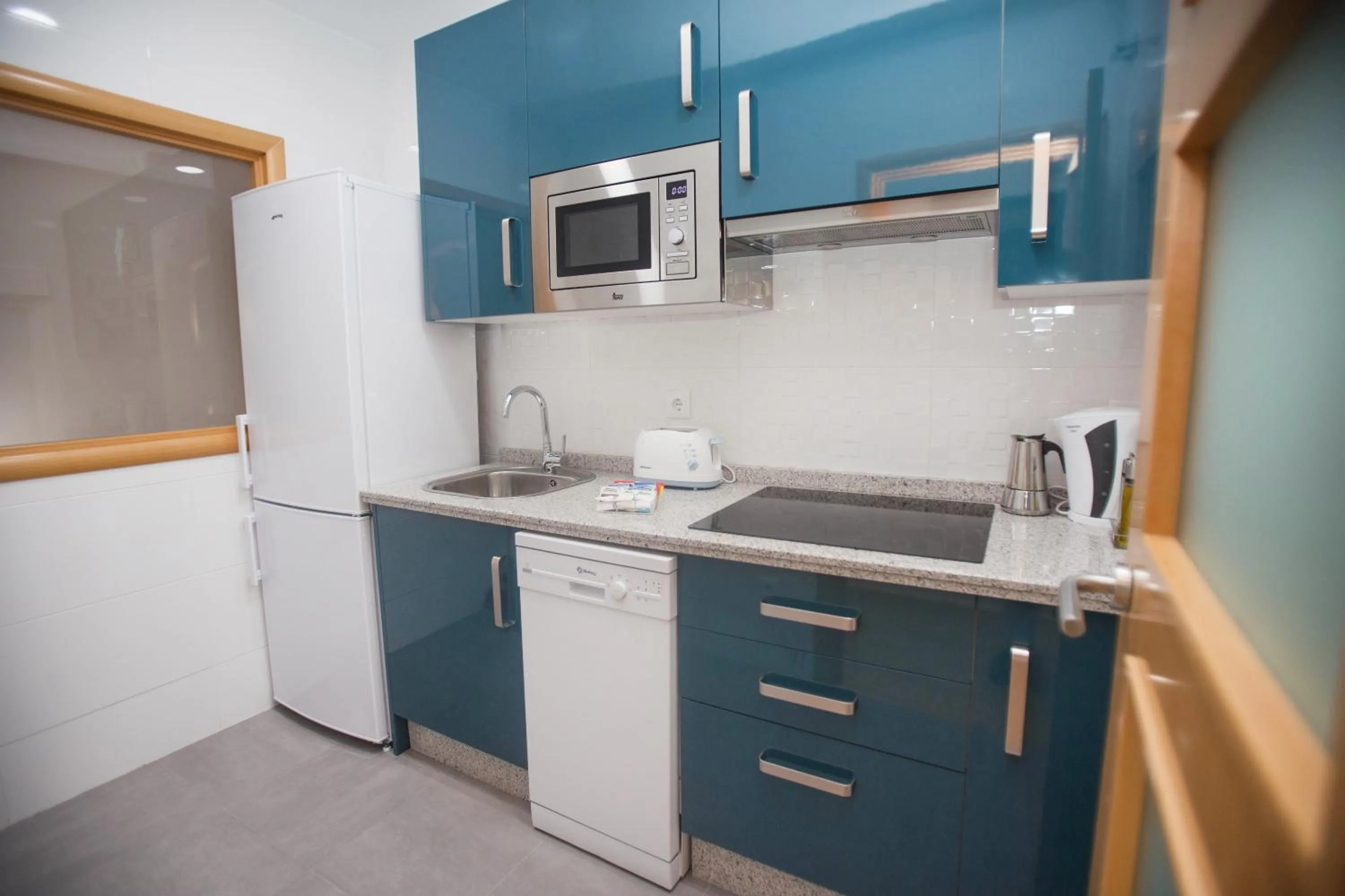 Kitchen or kitchenette in Apartamentos Soho Boutique Plaza Mayor Caceres