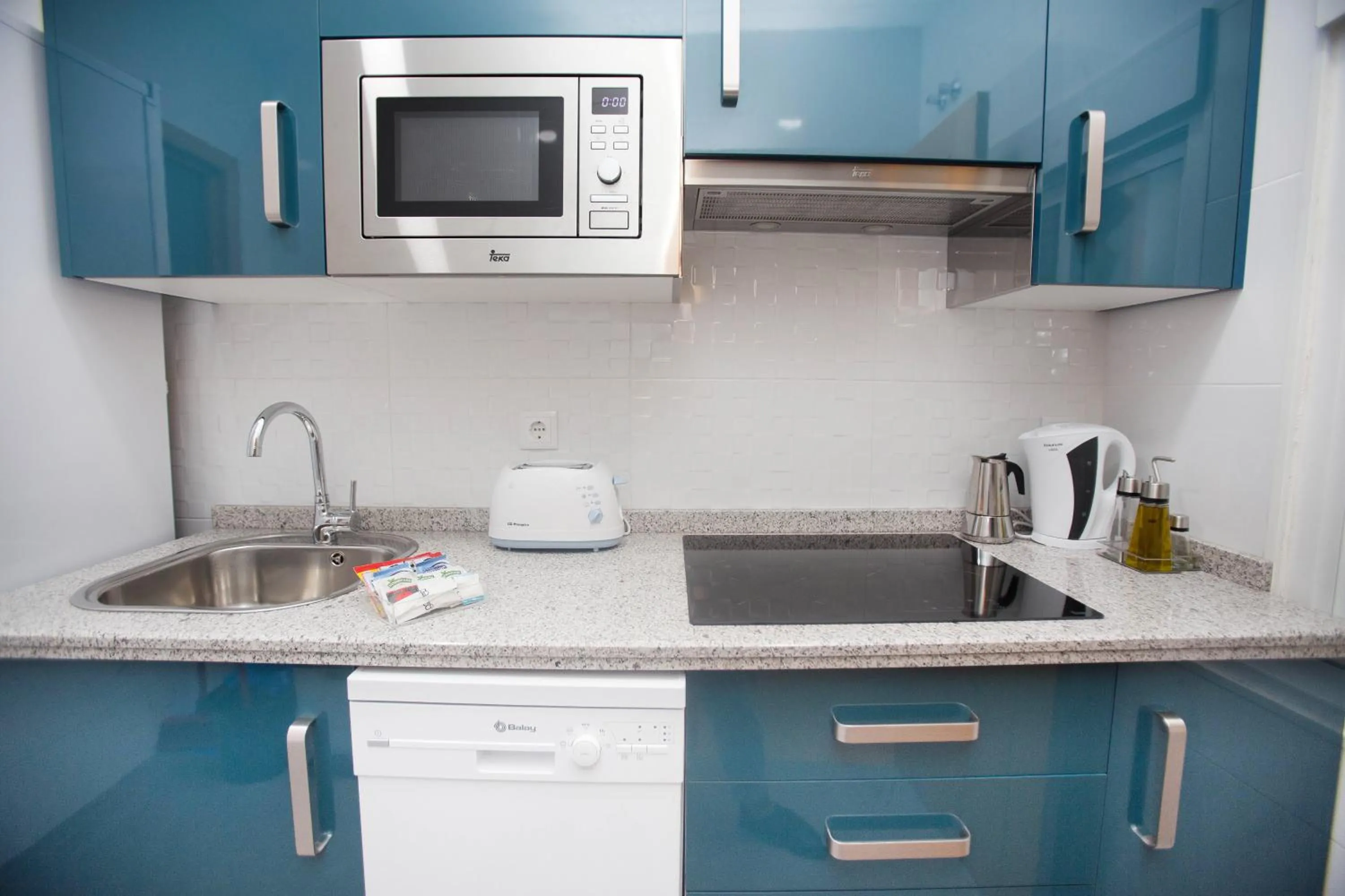 Kitchen or kitchenette in Apartamentos Soho Boutique Plaza Mayor Caceres