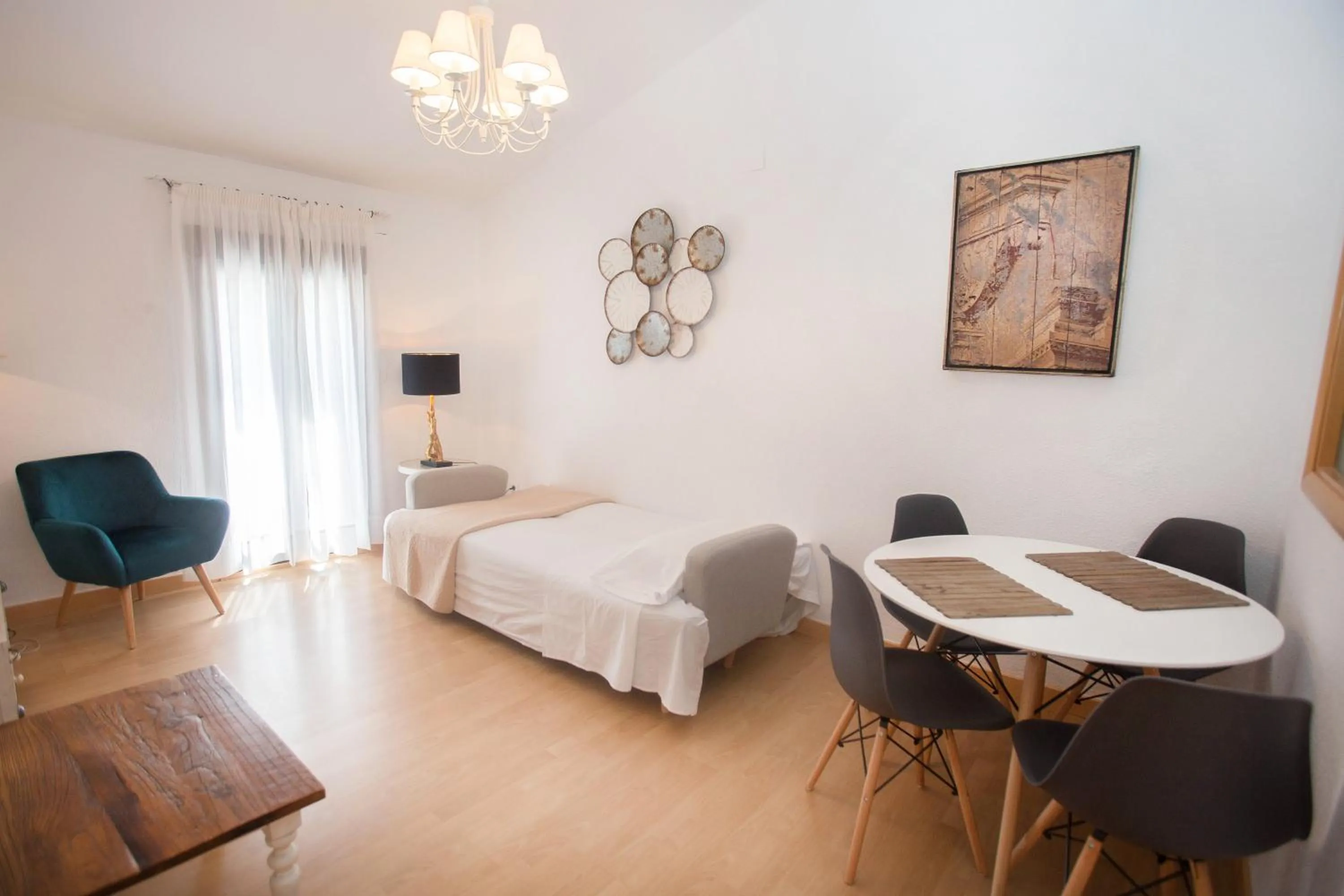 Living room, Bed in Apartamentos Soho Boutique Plaza Mayor Caceres
