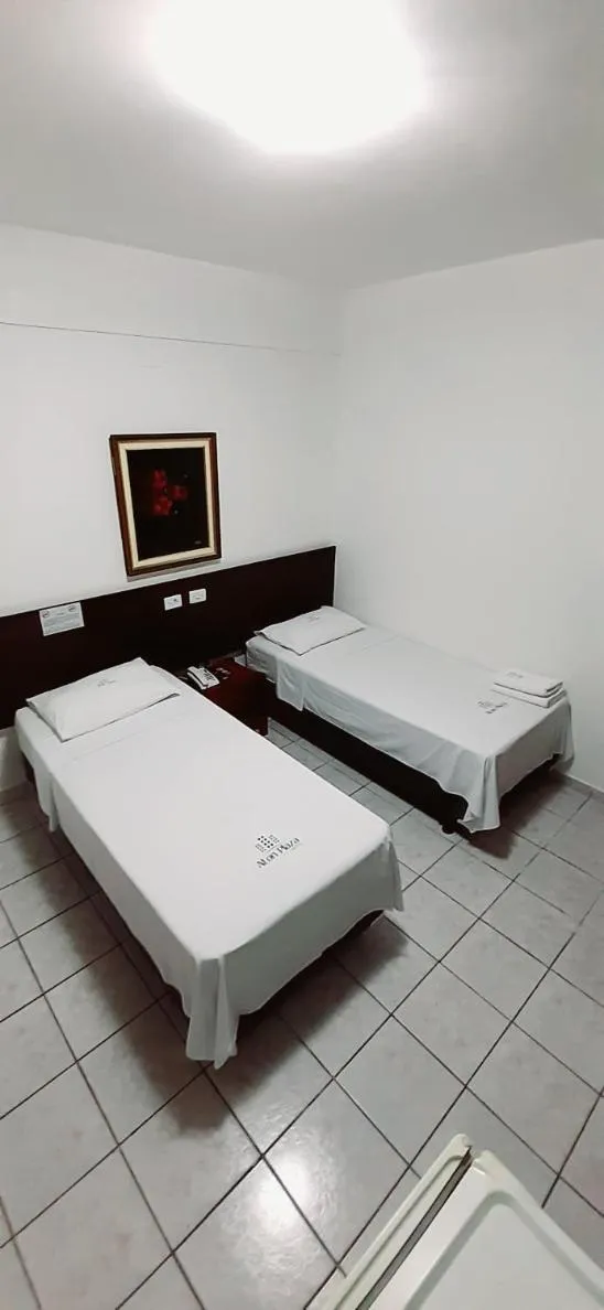 Bed in Aton Plaza Hotel