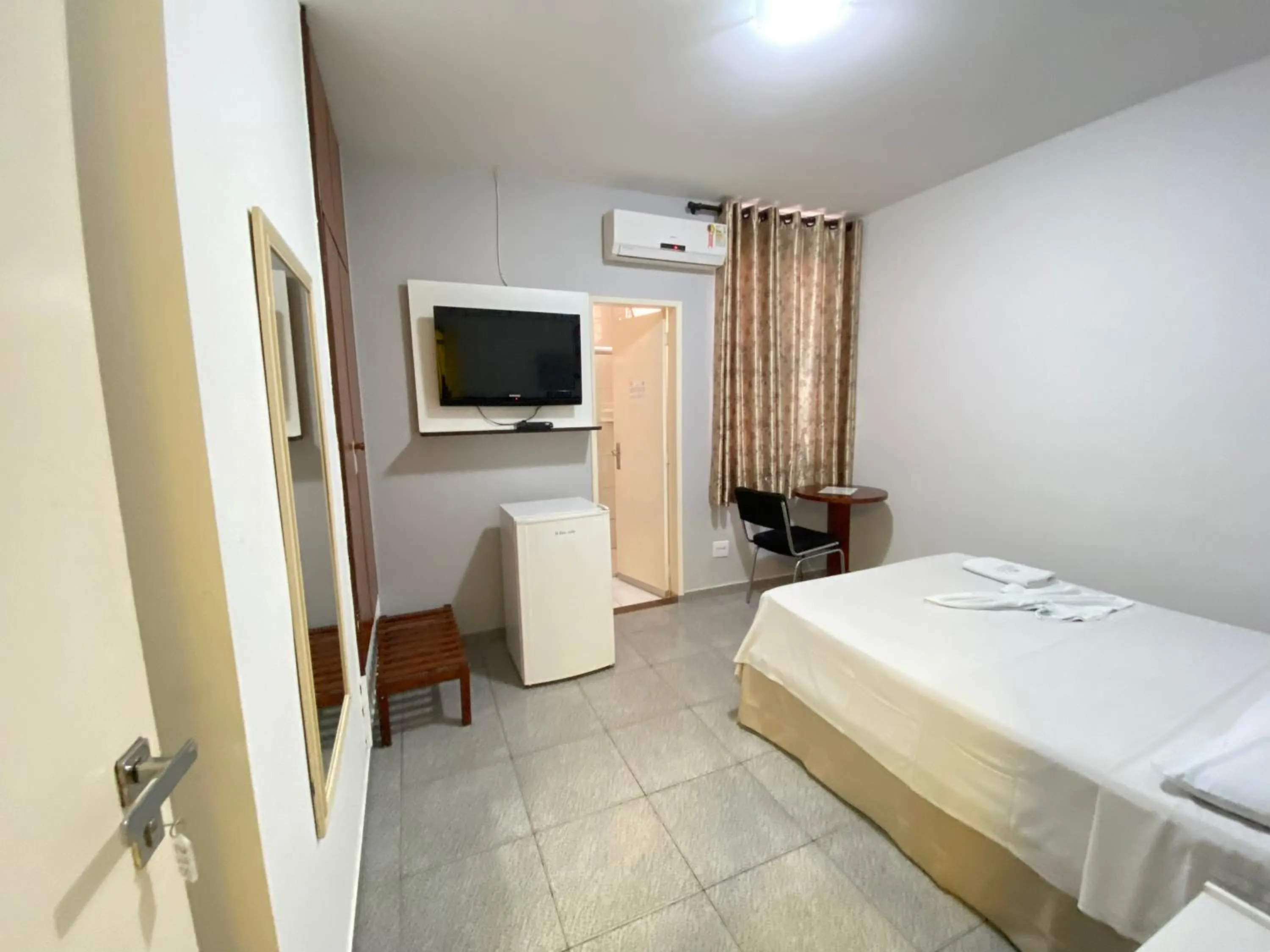 Photo of the whole room, Bed in Aton Plaza Hotel