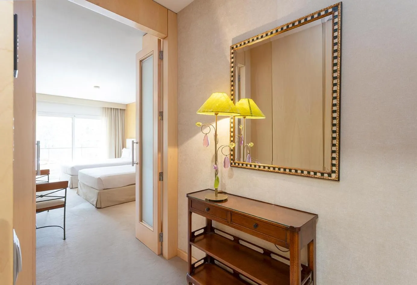 Bed in Suites del Mar Fenals Apartments