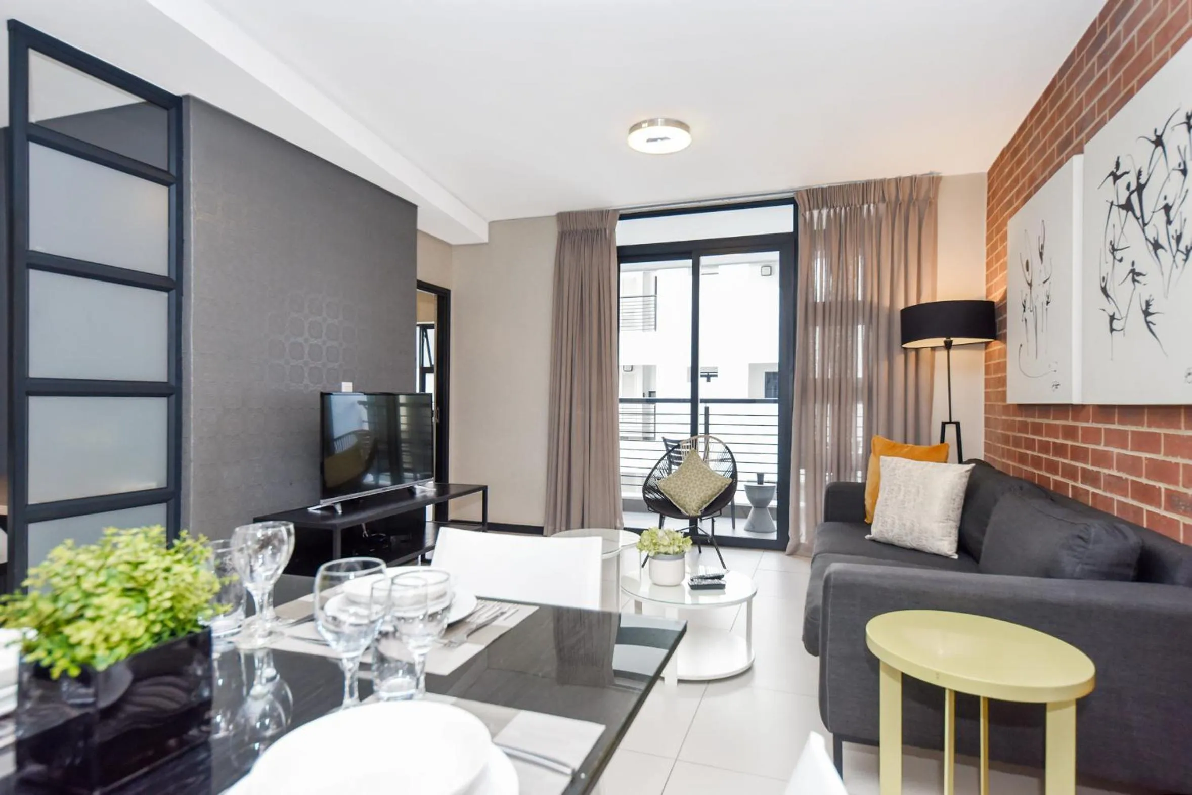 Communal lounge/ TV room in Easy Stay - The Vantage Rosebank