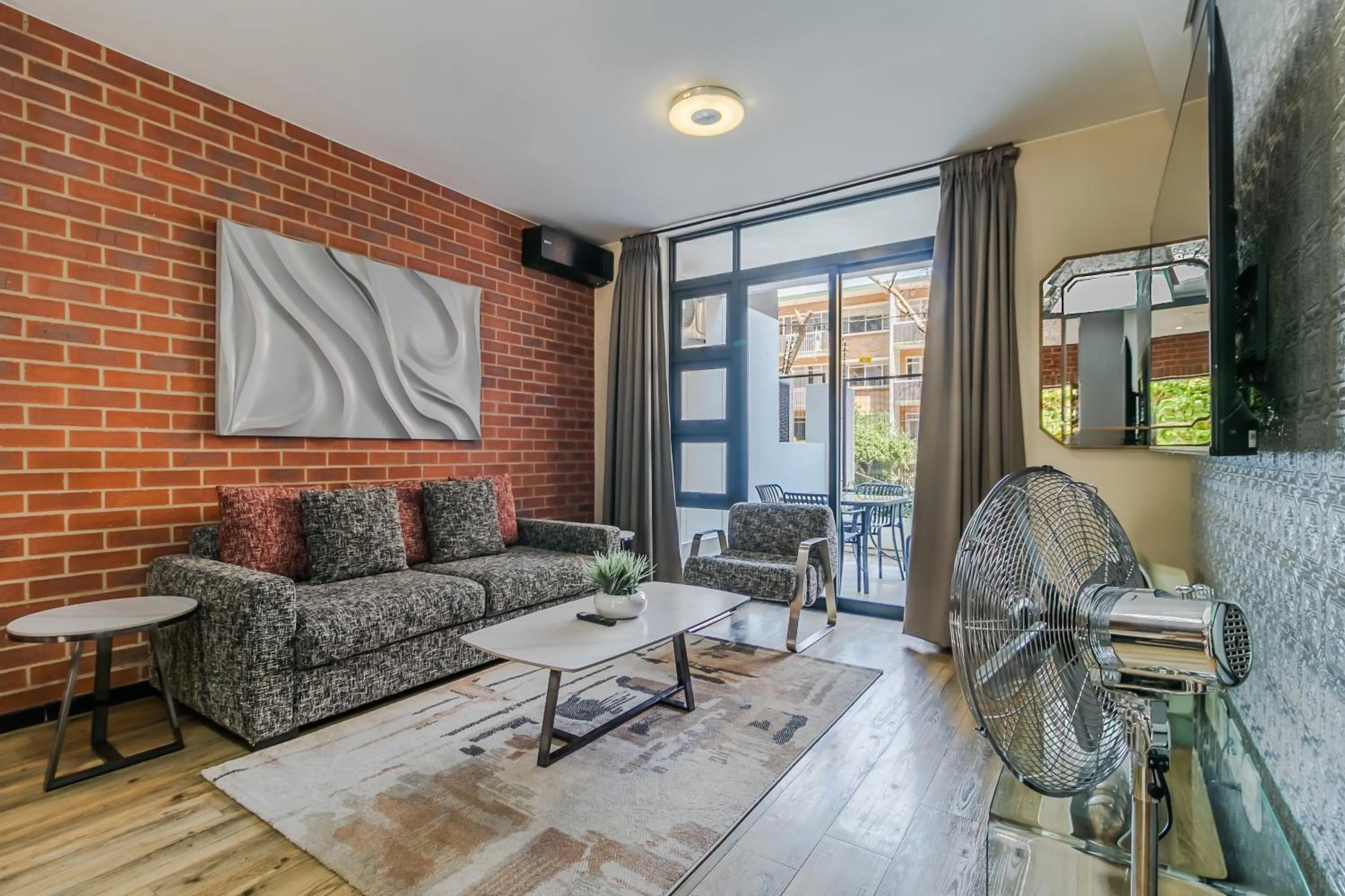 Communal lounge/ TV room in Easy Stay - The Vantage Rosebank