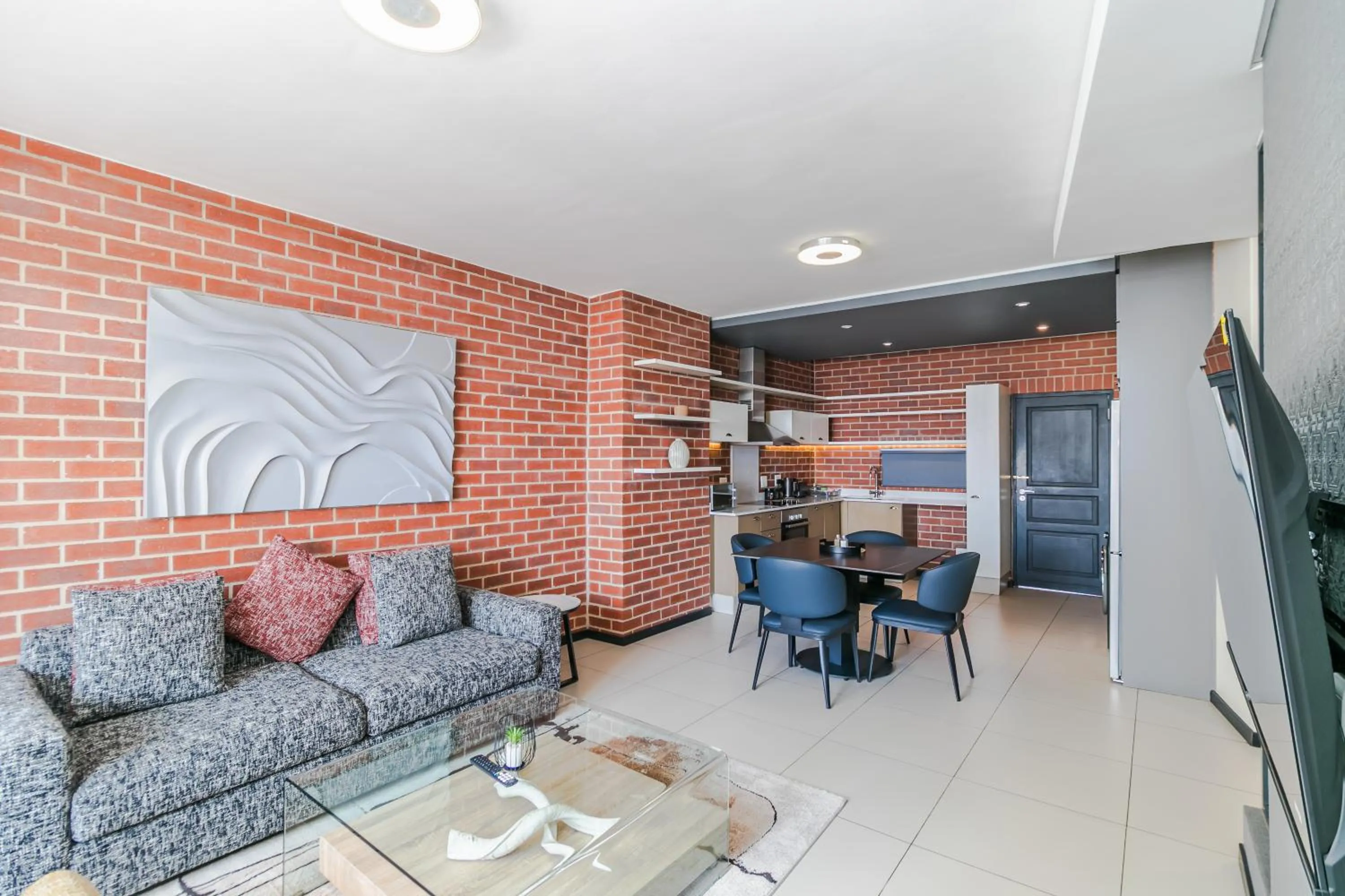 Communal lounge/ TV room in Easy Stay - The Vantage Rosebank