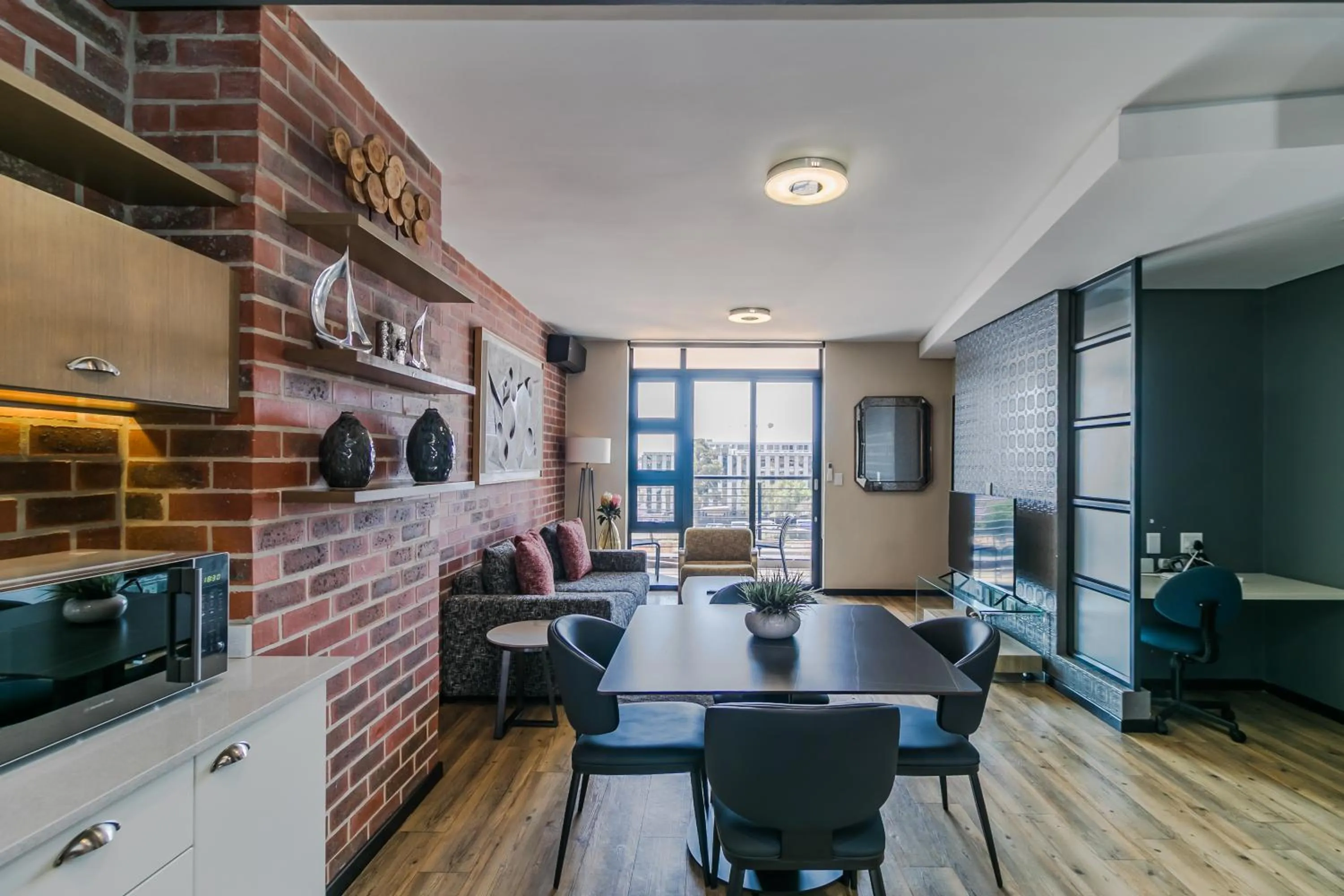 Communal lounge/ TV room in Easy Stay - The Vantage Rosebank