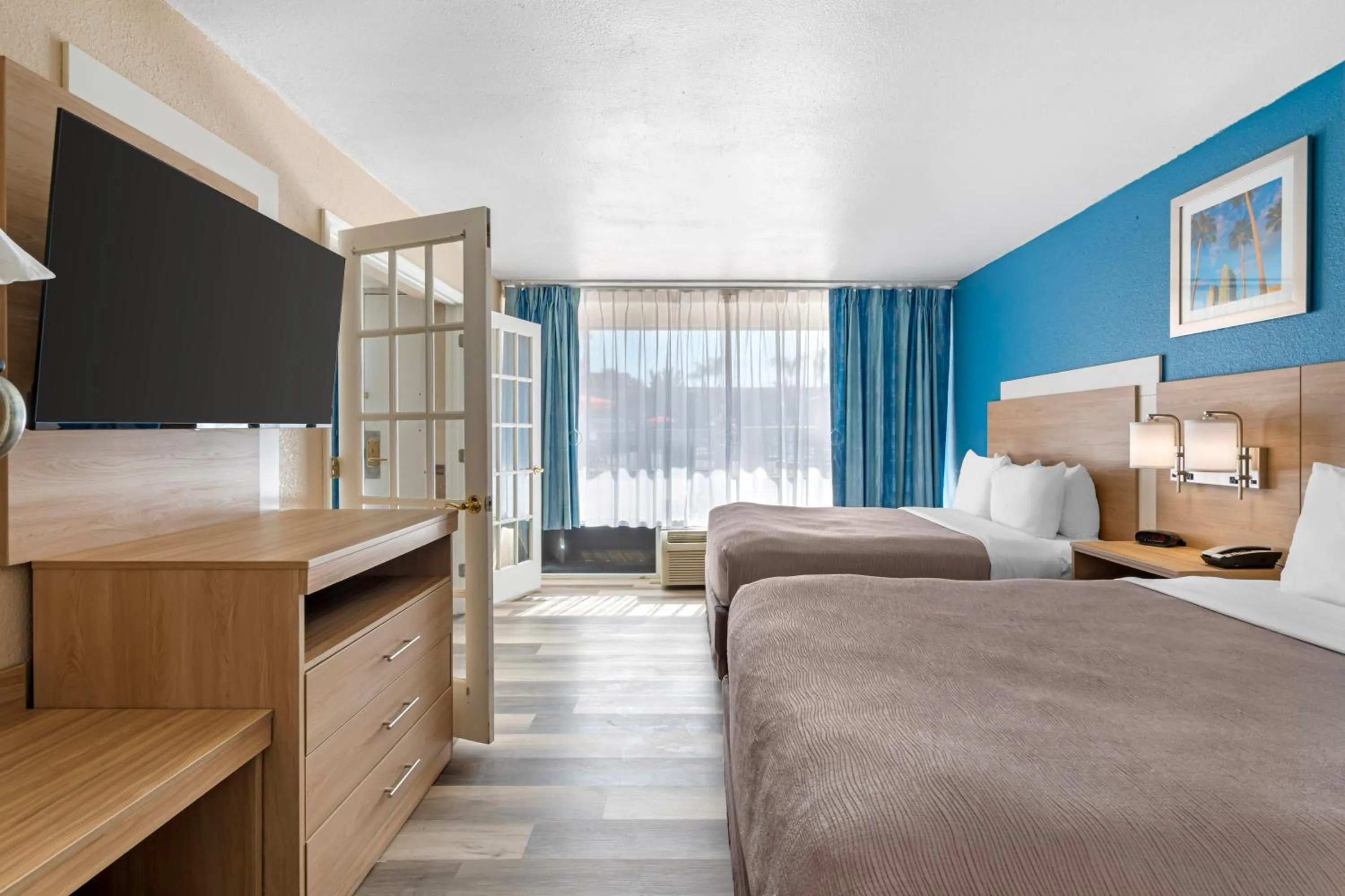 Bed in Quality Inn & Suites Conference Center