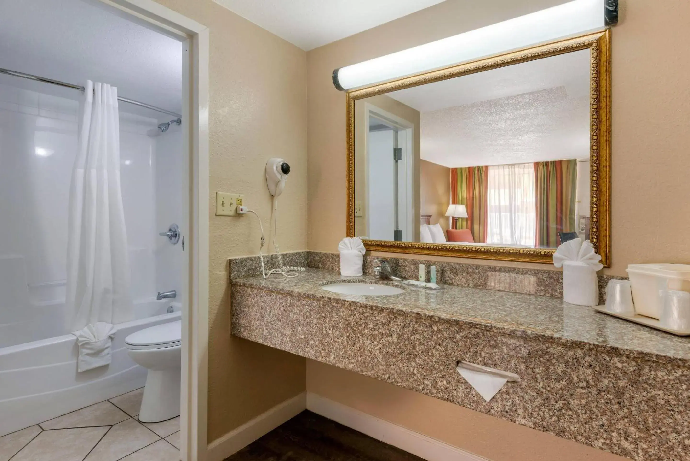 Bedroom in Quality Inn & Suites Conference Center Bedroom in Quality Inn & Suites Conference Center