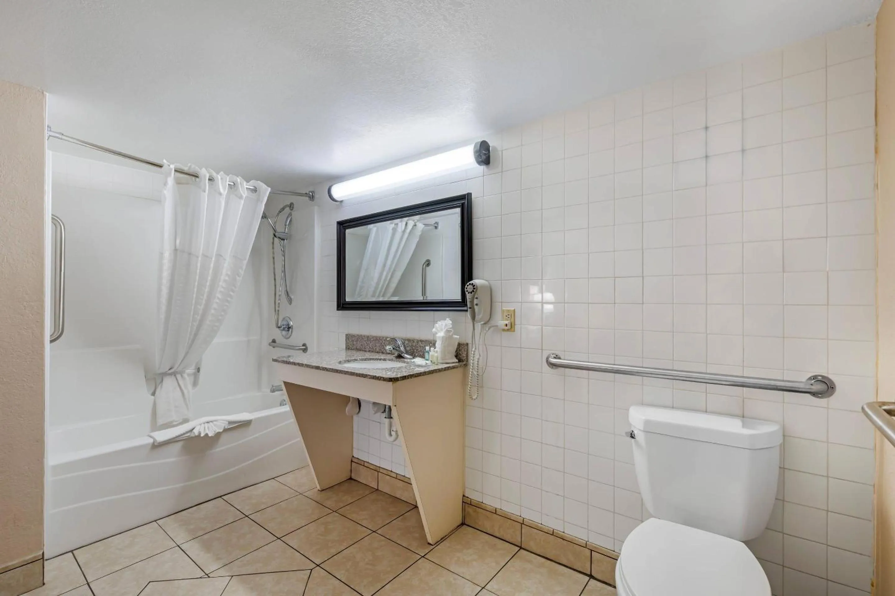 Bedroom in Quality Inn & Suites Conference Center