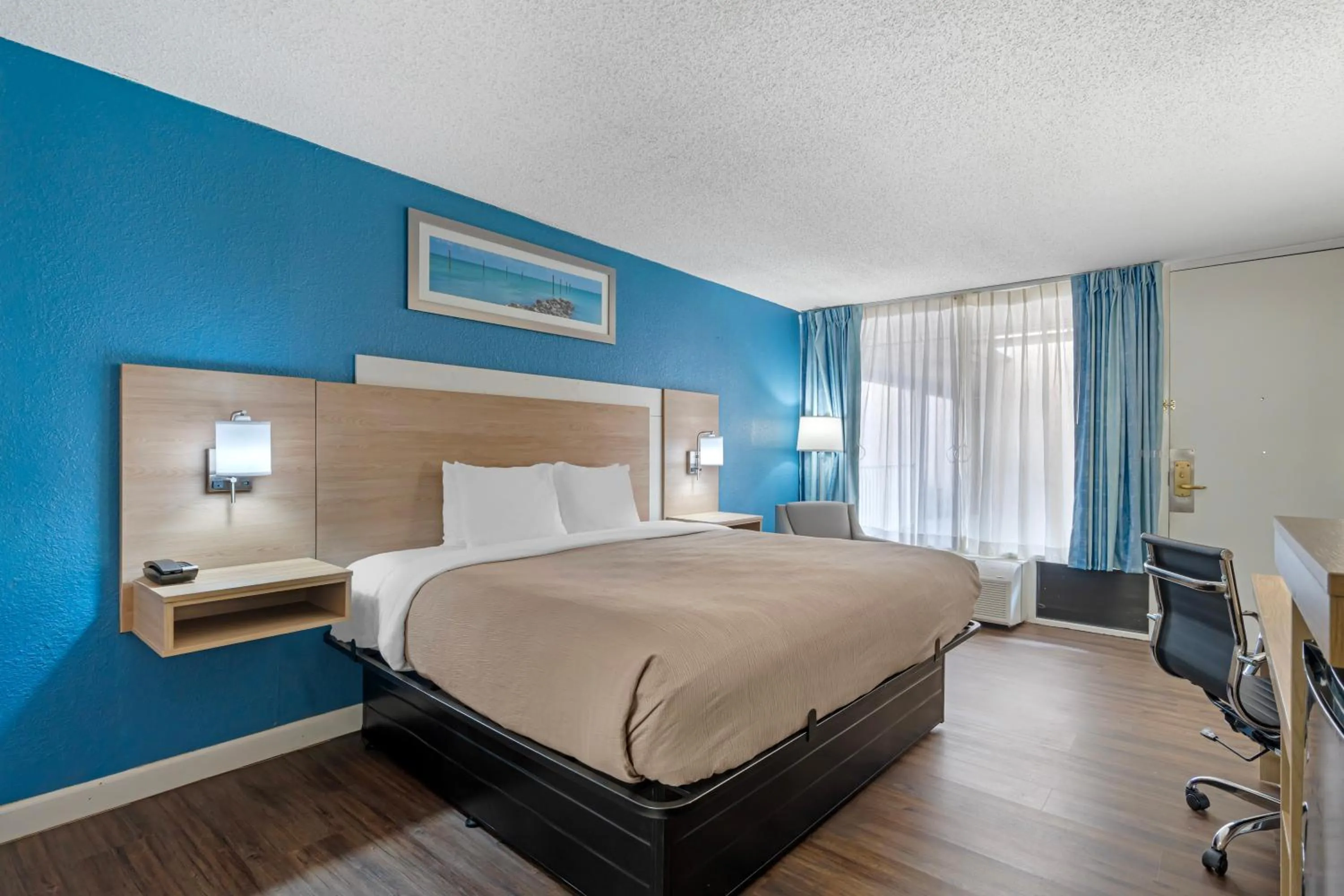 Bed in Quality Inn & Suites Conference Center