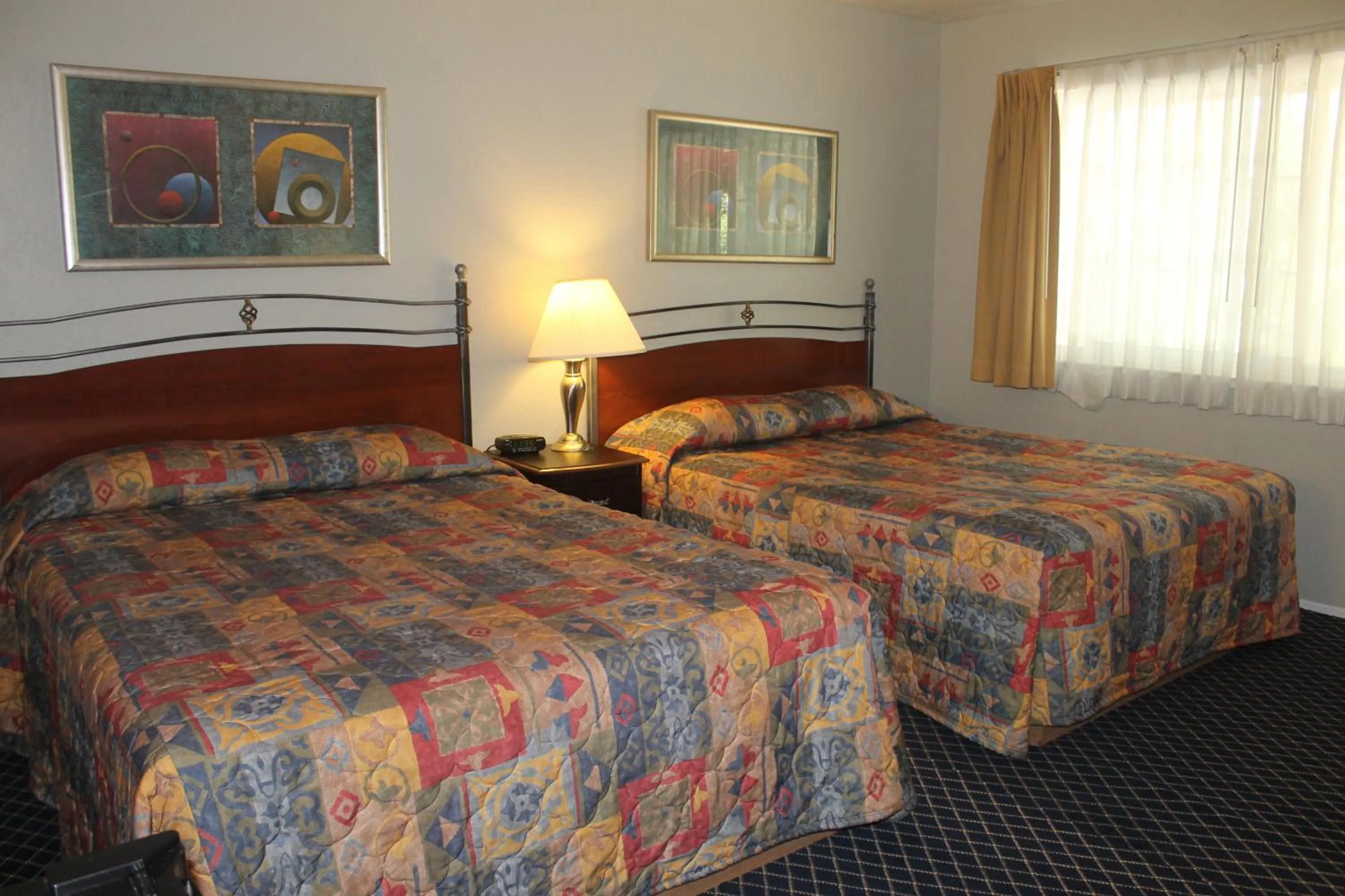 Bed in Golden Chain Motel