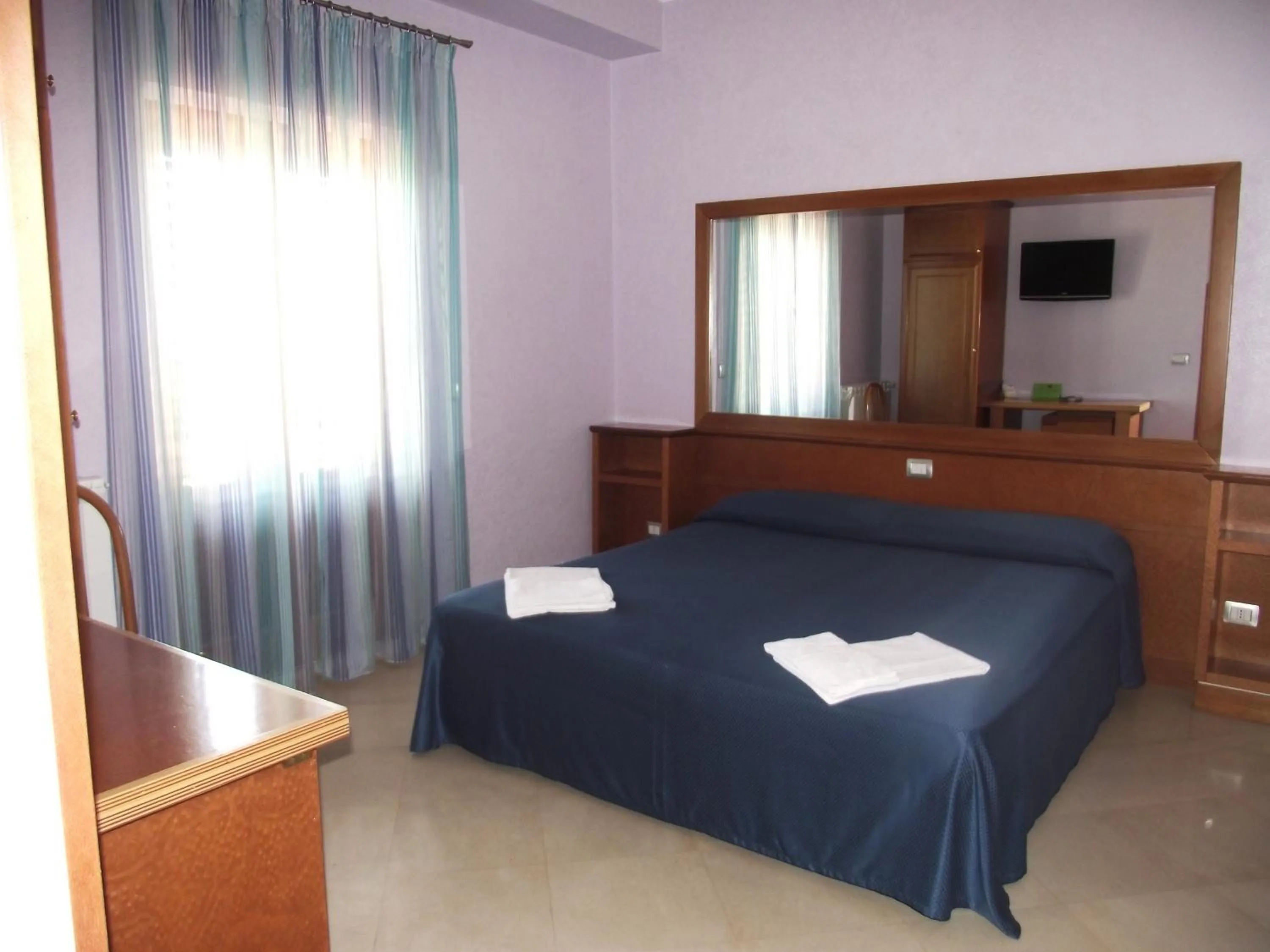 Bed in Affittacamere Stranamore