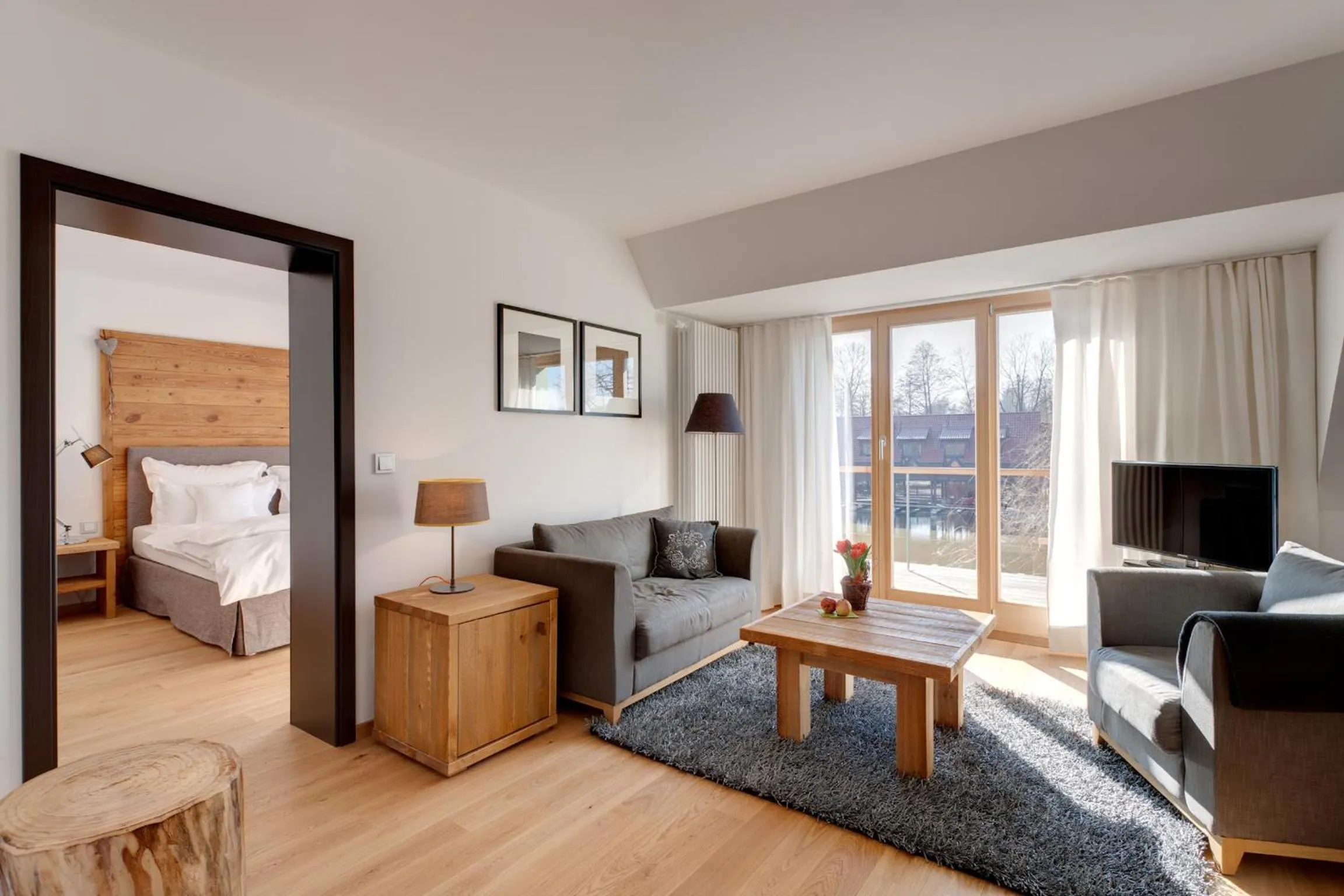 Living room, Bed in Hotel Strandhaus - Boutique Resort & Spa