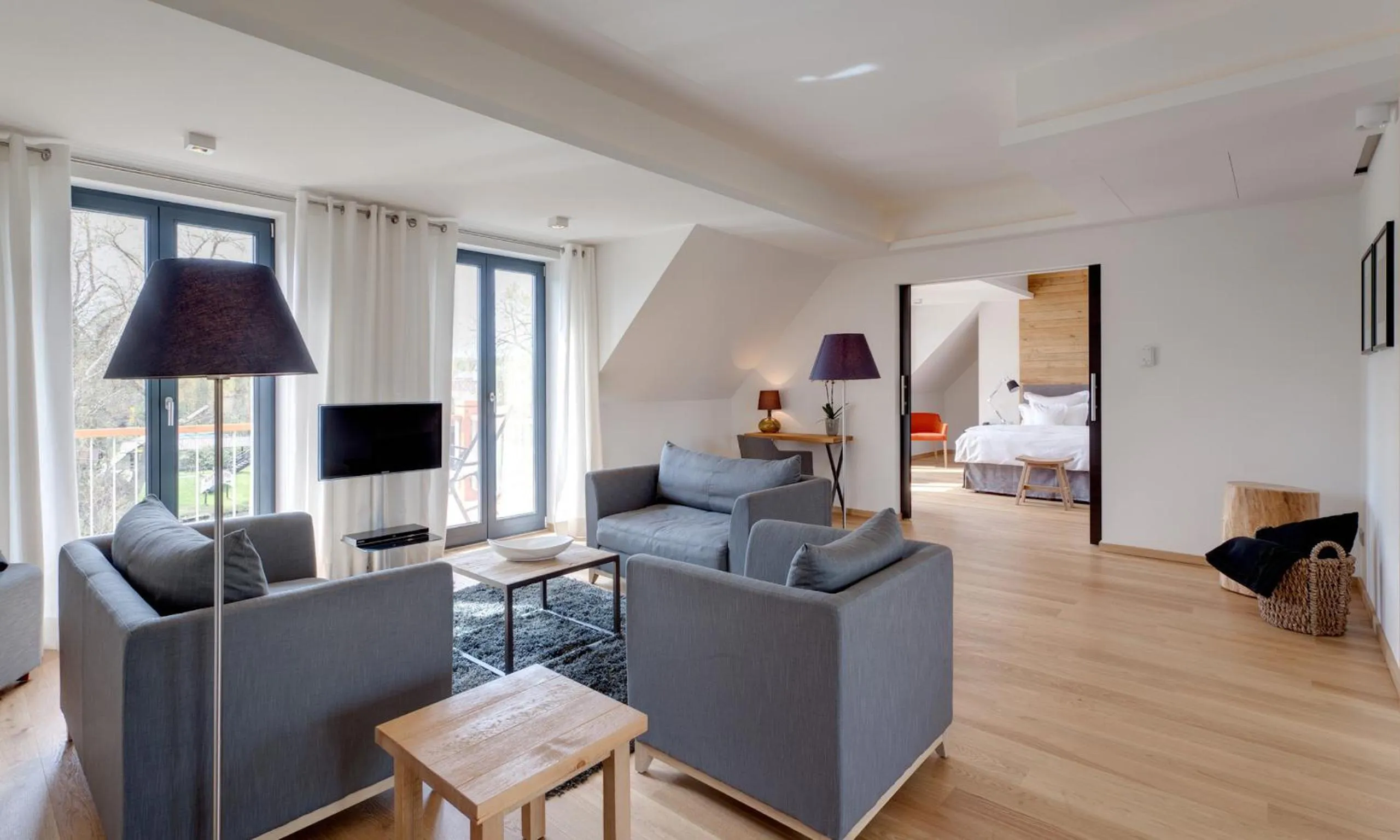 Living room, Bed in Hotel Strandhaus - Boutique Resort & Spa