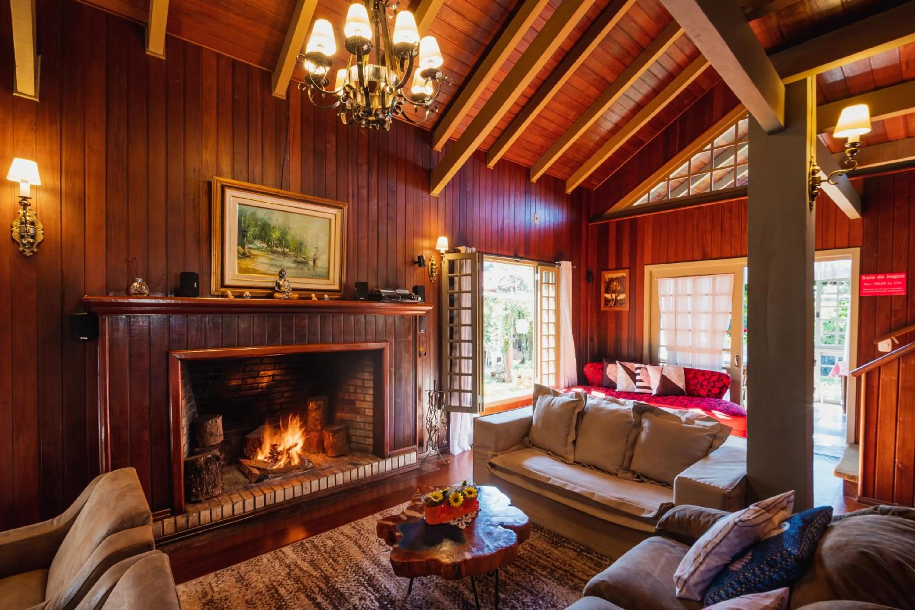Living room in Pousada Casa Rosa