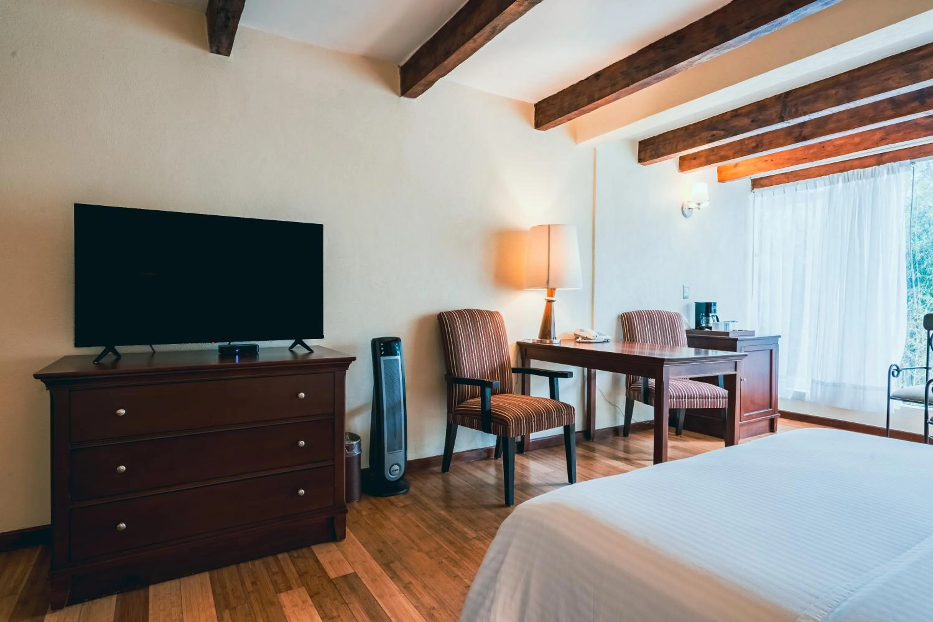 Seating area, Bed in Hotel Villa Mercedes San Cristobal