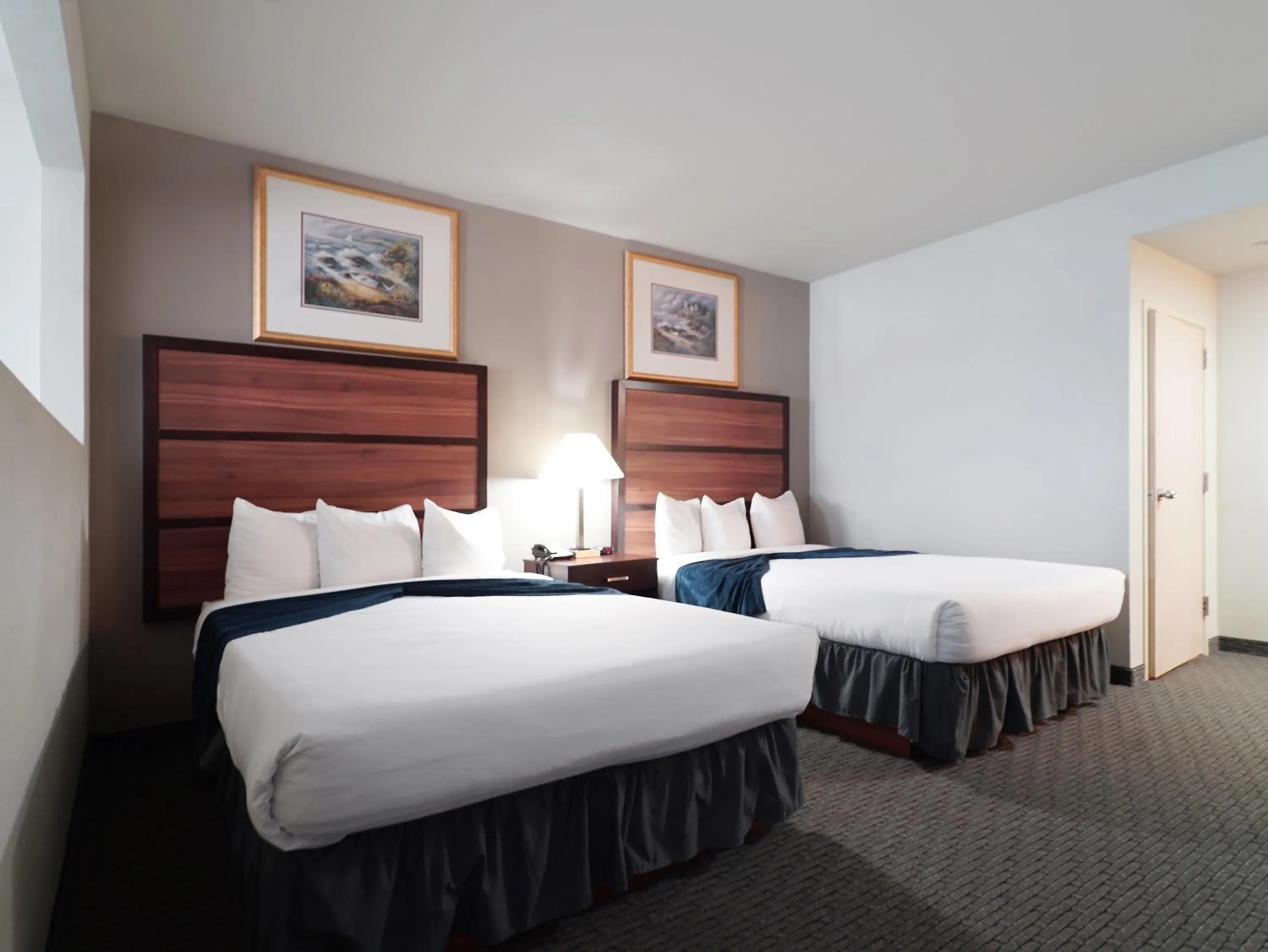 Bed in BayVue Hotel, Resort & Suites