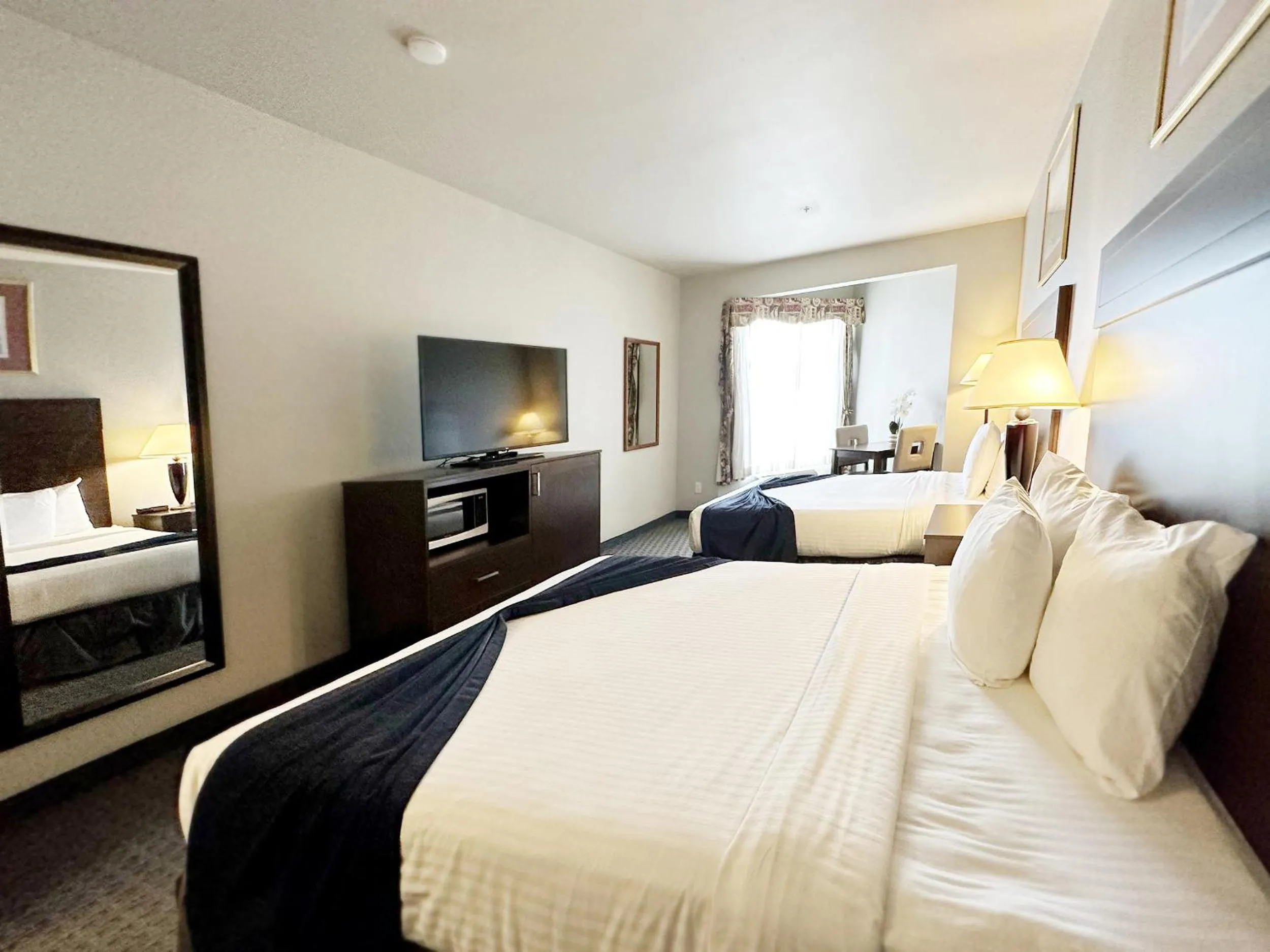 Bed in BayVue Hotel, Resort & Suites