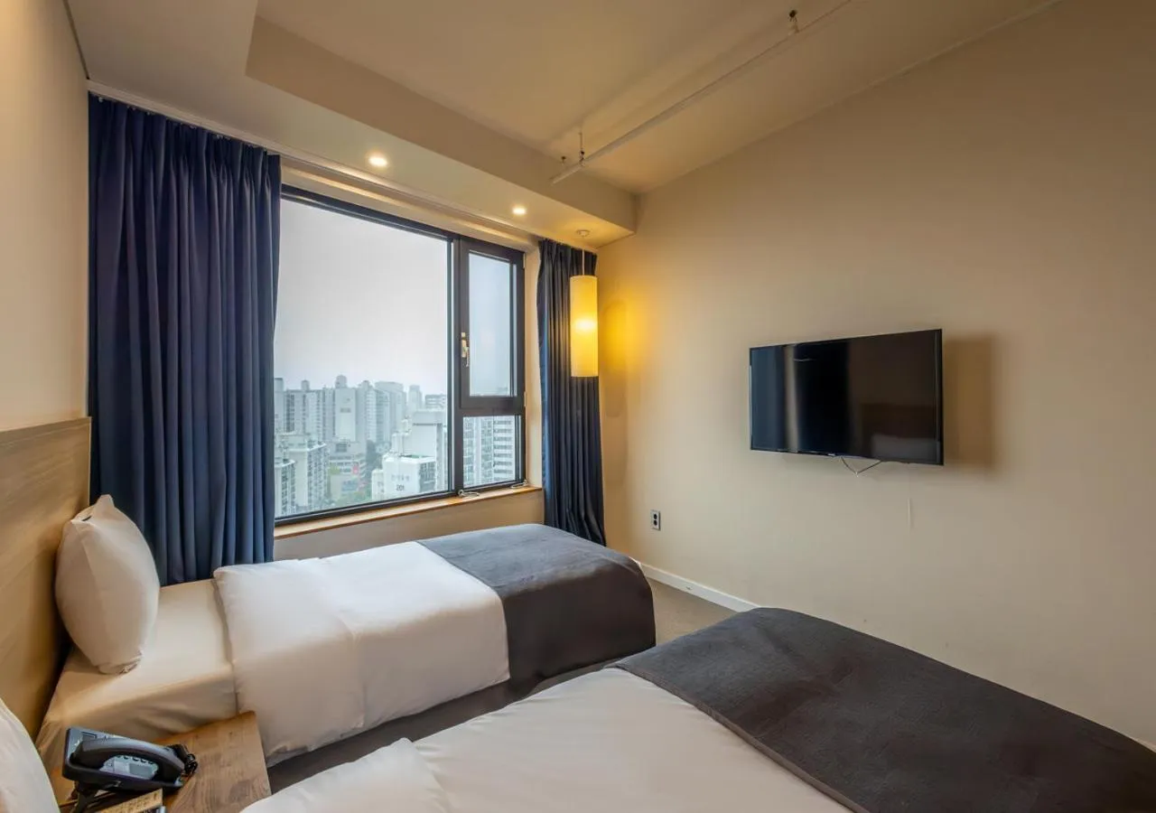 Bedroom, Bed in JK Blossom Hotel