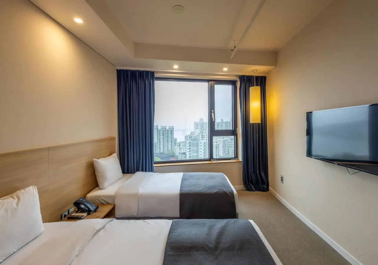 Bedroom, Bed in JK Blossom Hotel