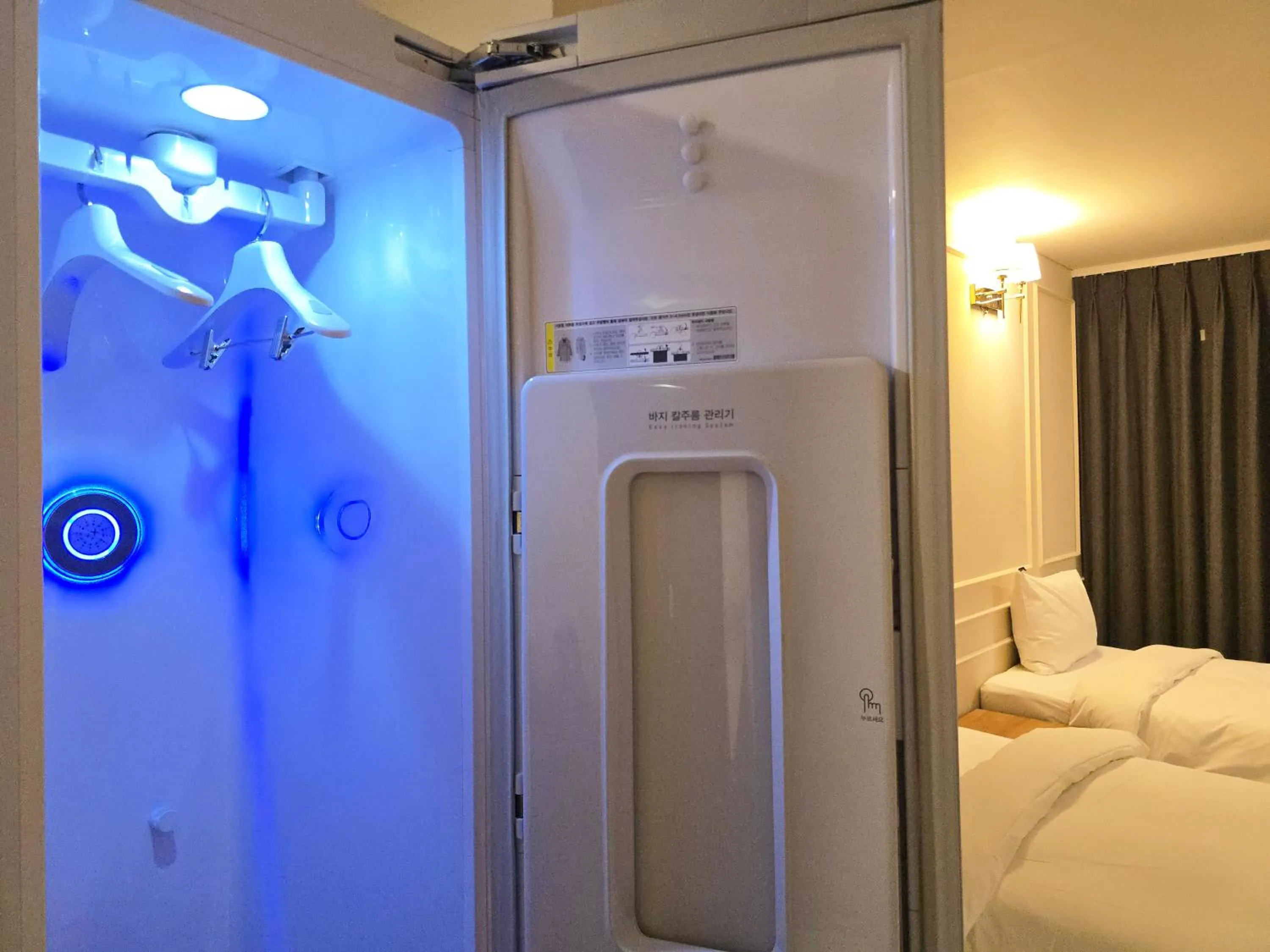 laundry, Bed in JK Blossom Hotel