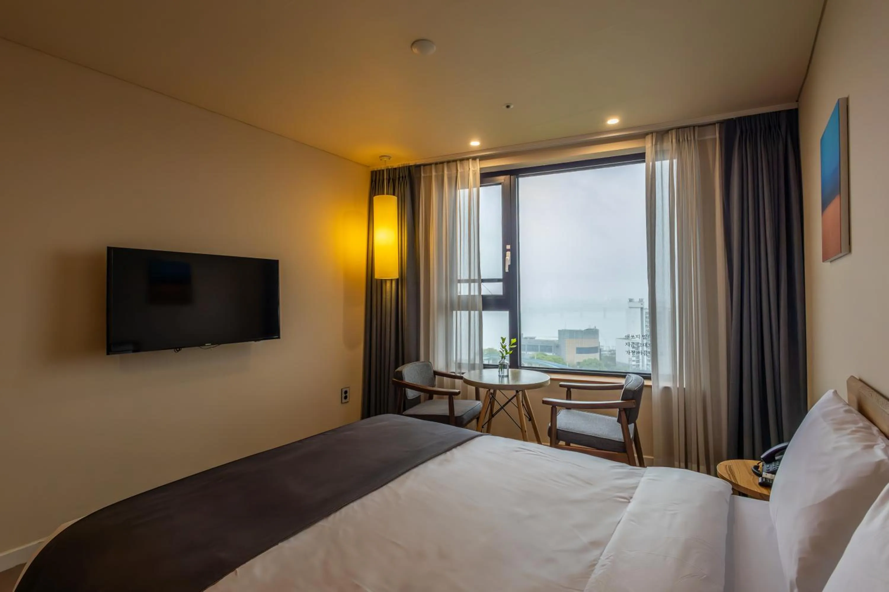 Bedroom, Bed in JK Blossom Hotel