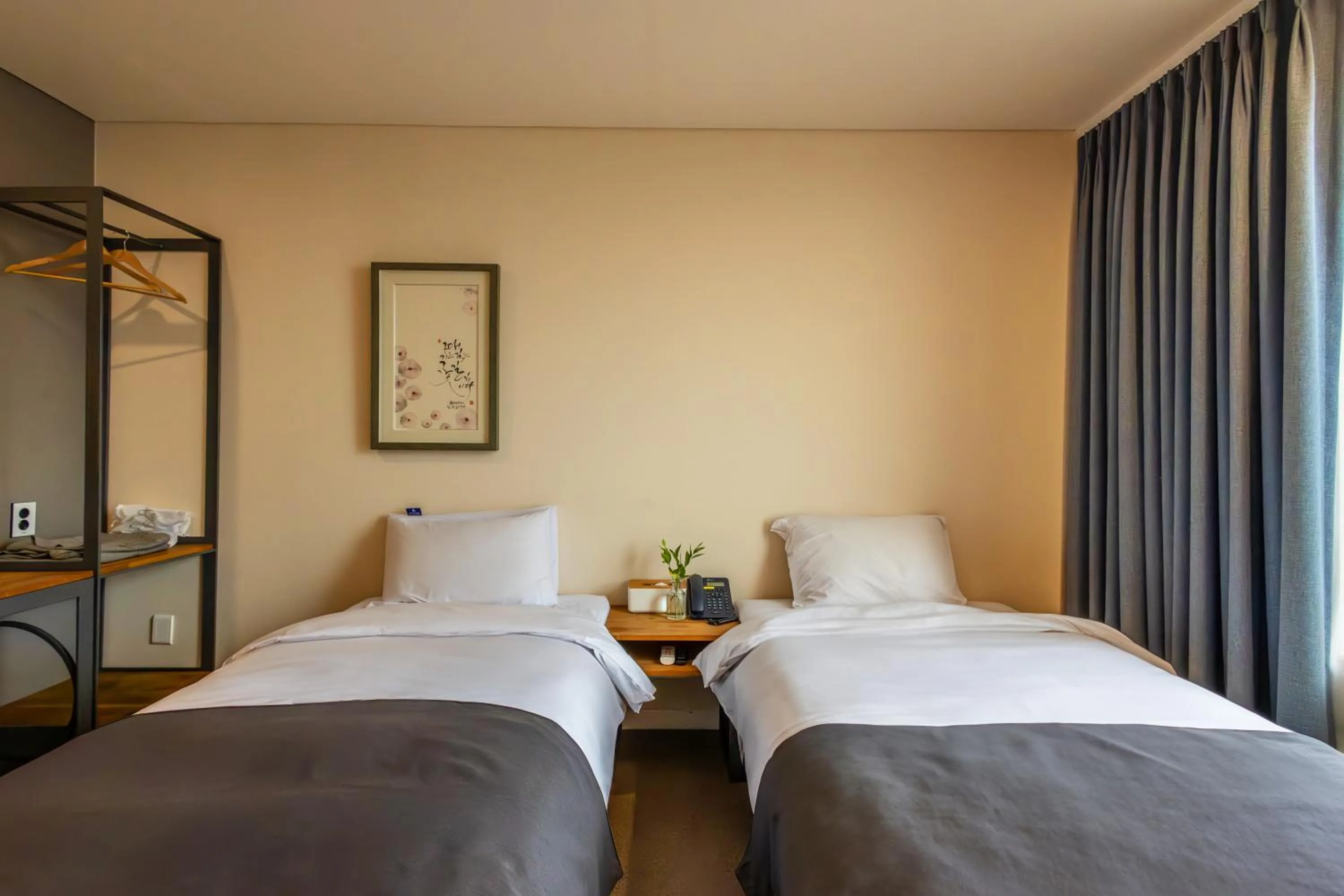 Bedroom, Bed in JK Blossom Hotel