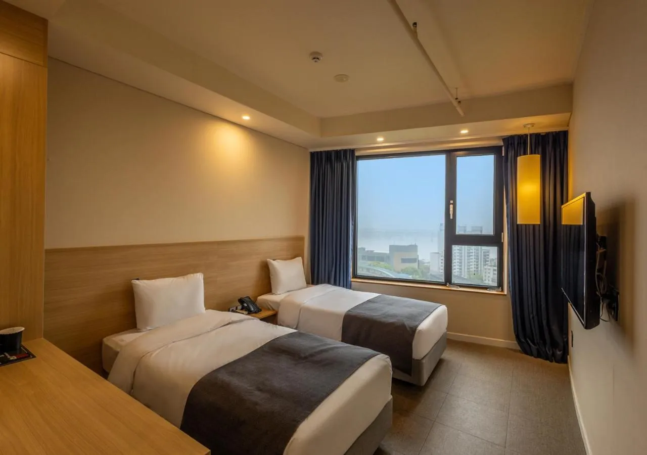 Bedroom, Bed in JK Blossom Hotel