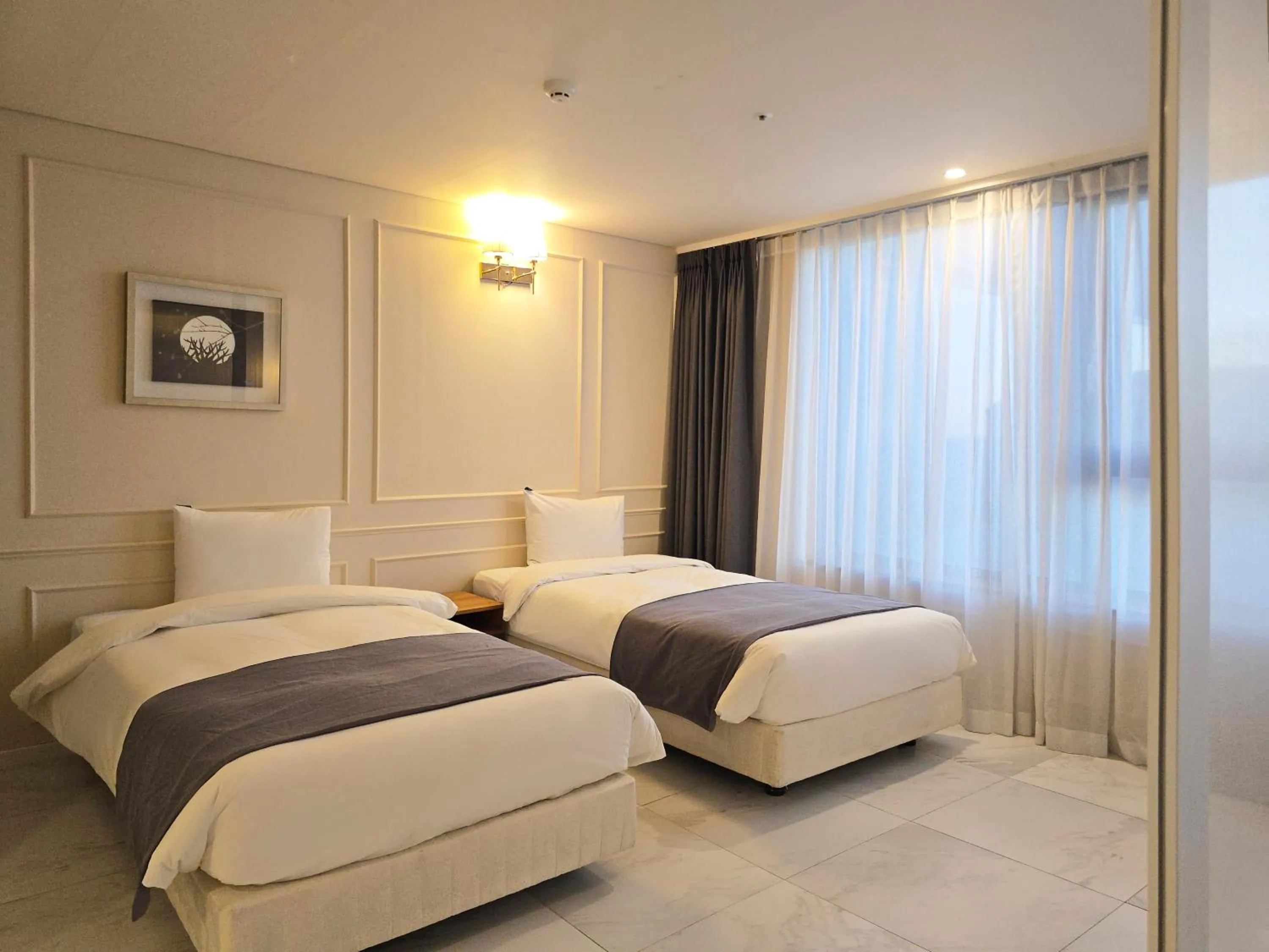 Bedroom, Bed in JK Blossom Hotel