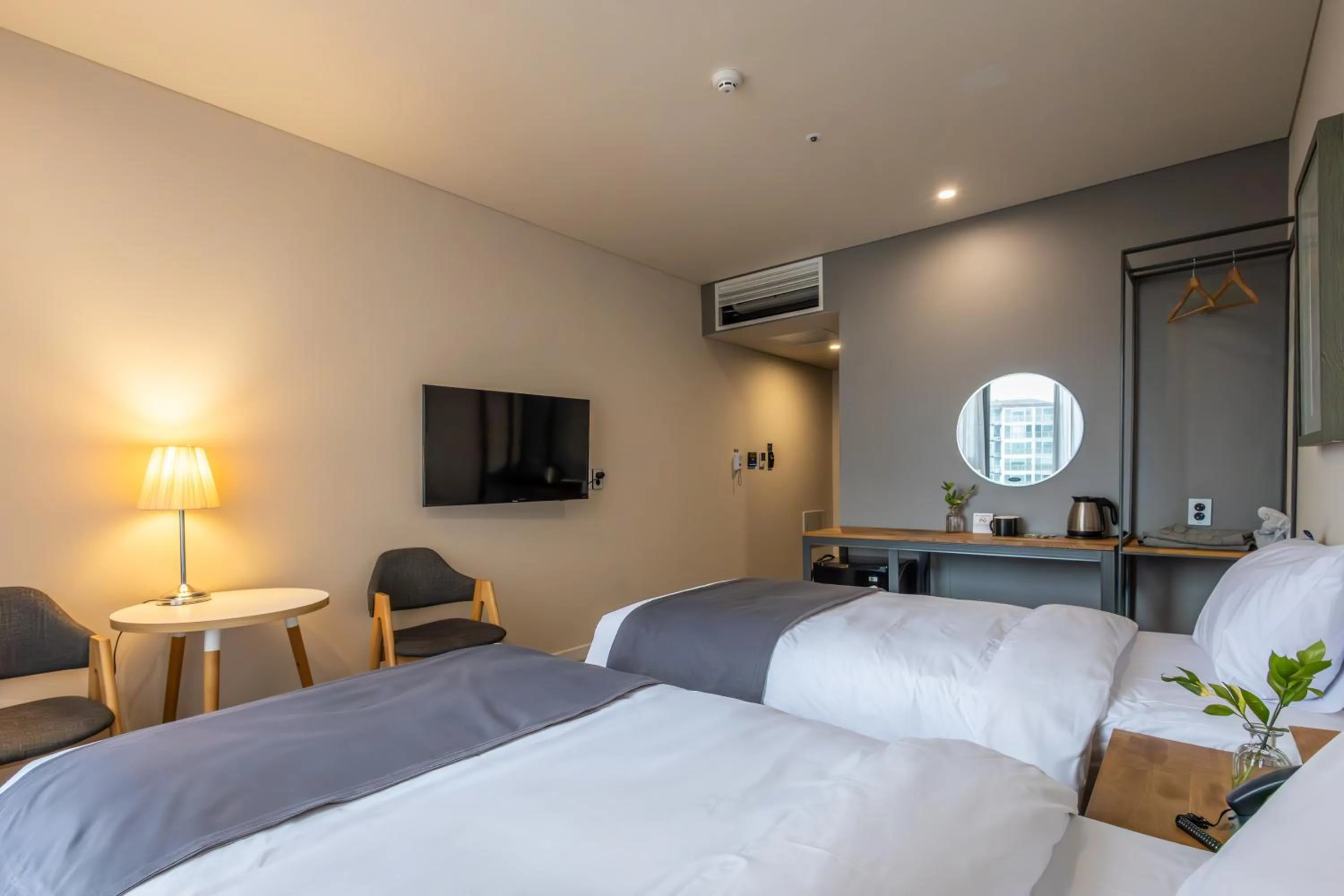 Bedroom, Bed in JK Blossom Hotel