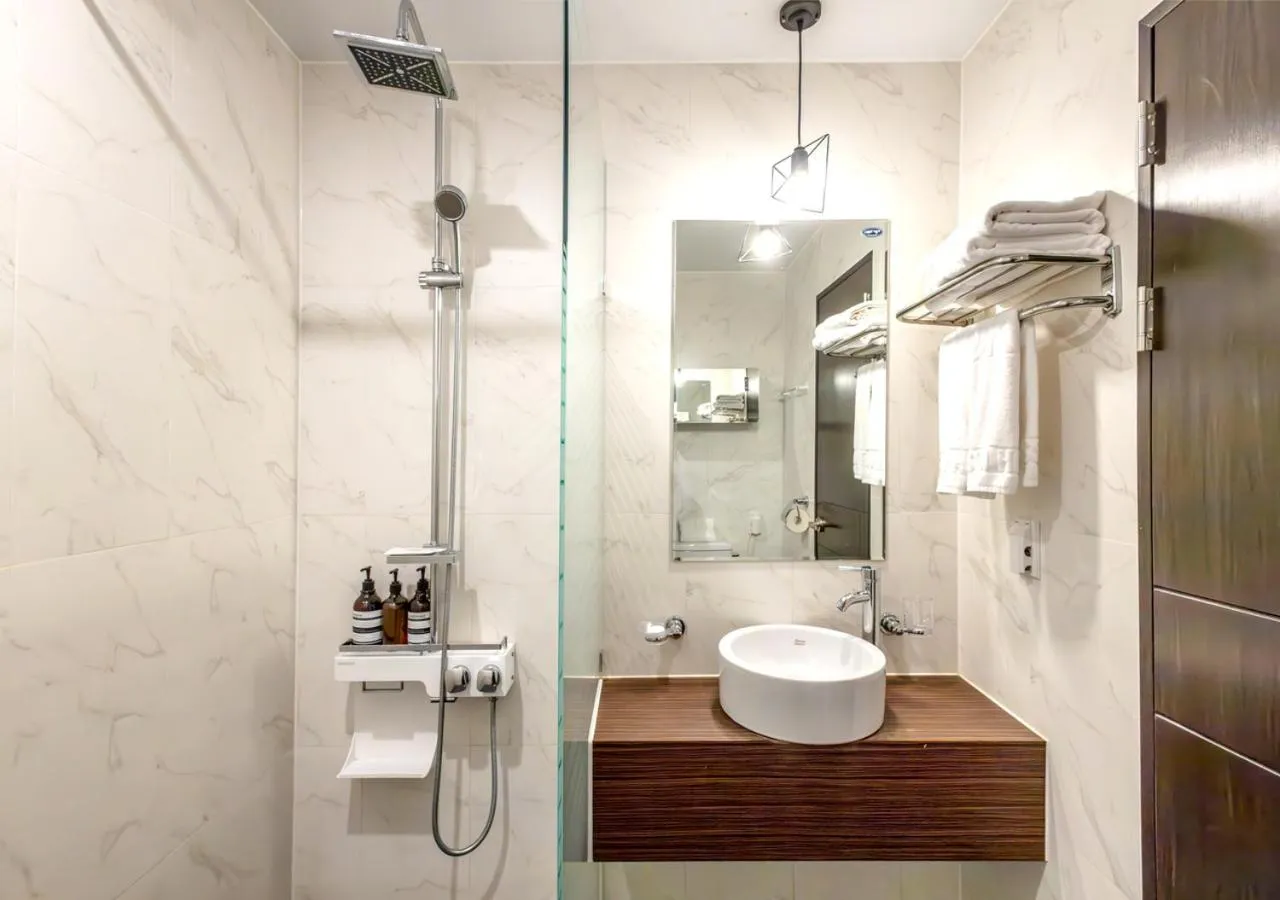 Bathroom in JK Blossom Hotel