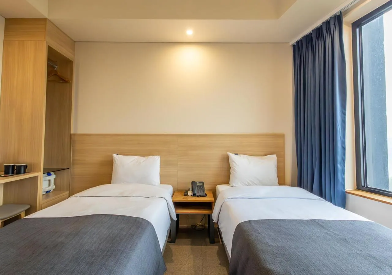 Bedroom, Bed in JK Blossom Hotel