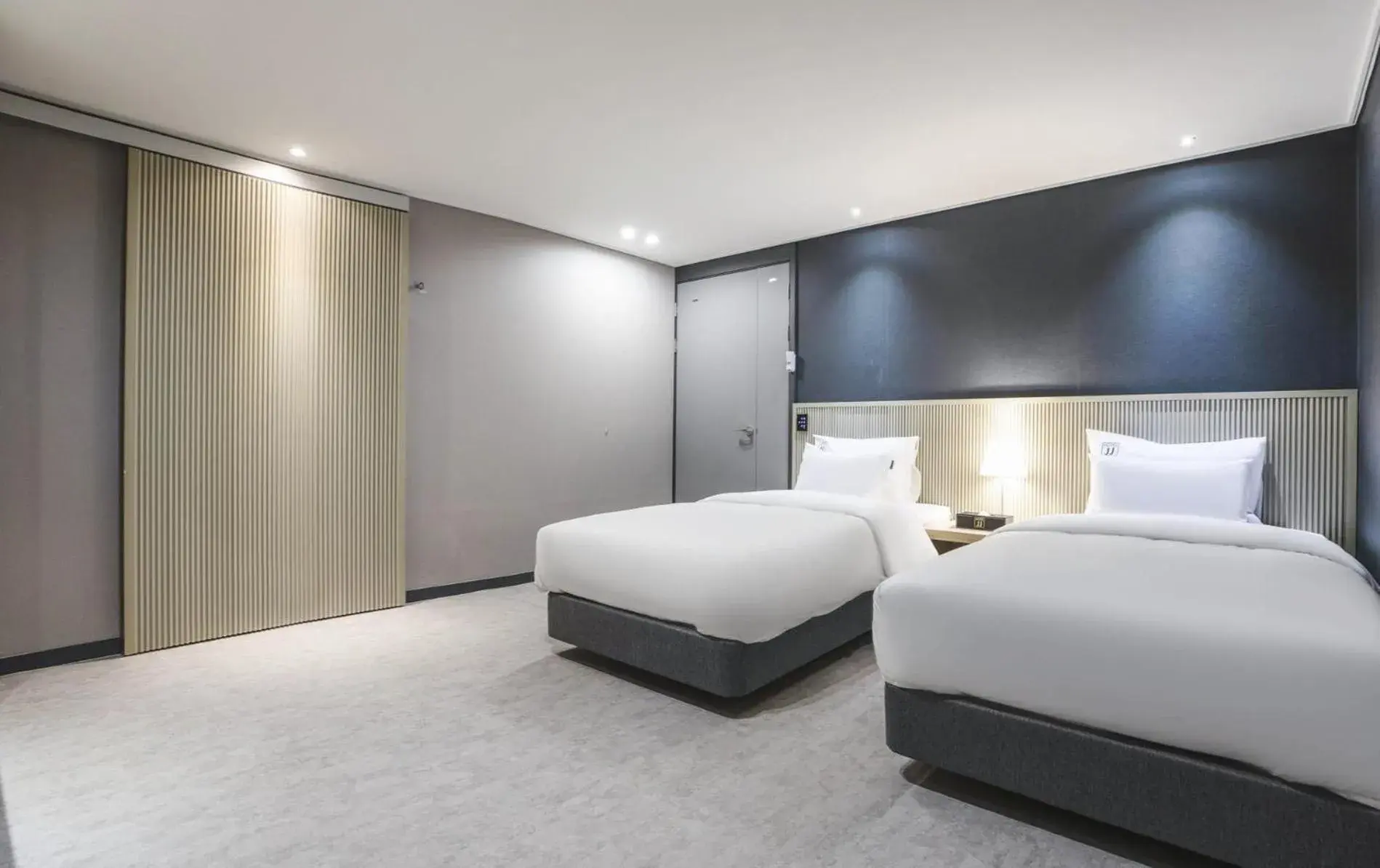 Bed in JJ Hotel Bed in JJ Hotel