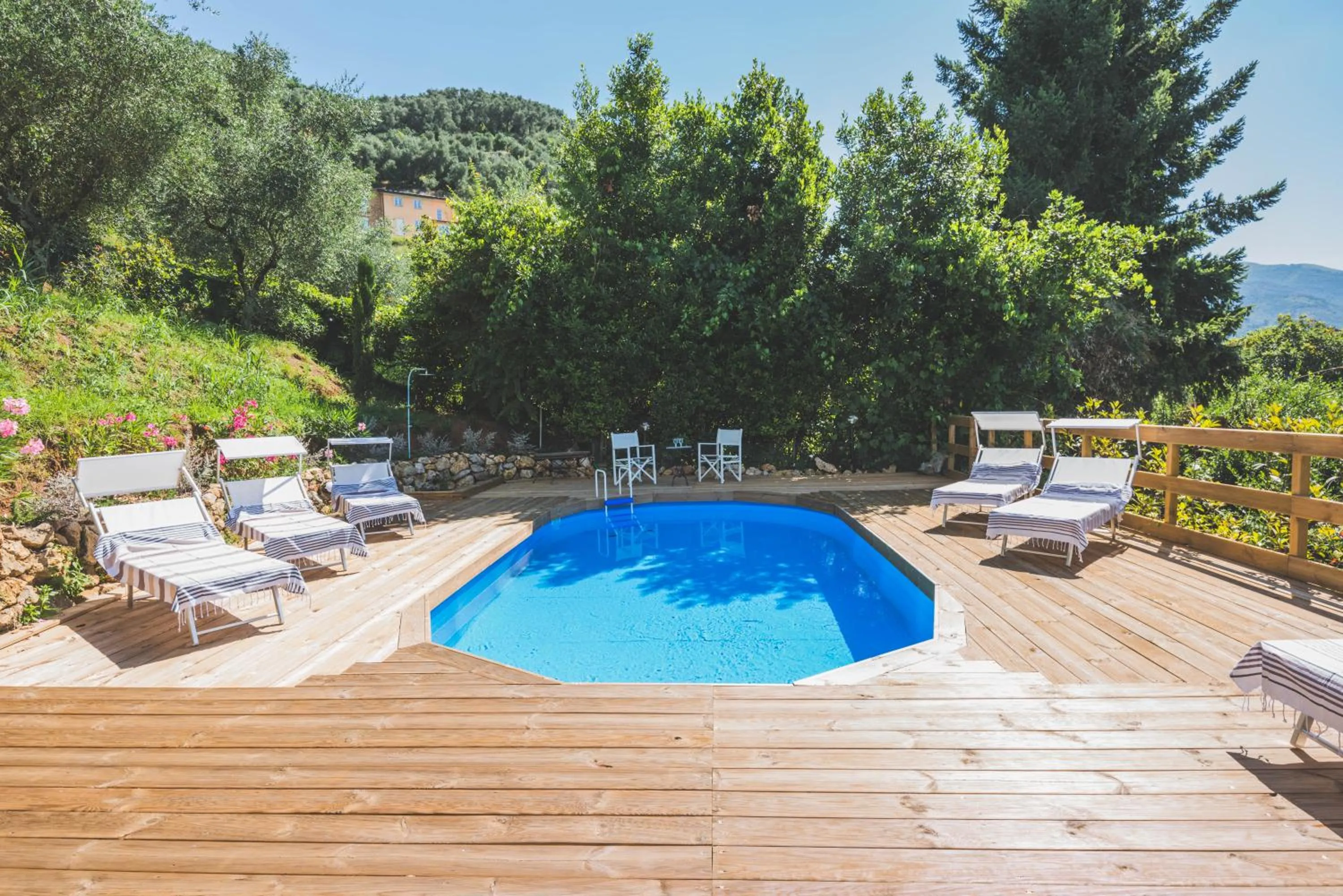 Exclusive beautiful pool house surrounded by greenery, modern, luxury finishes