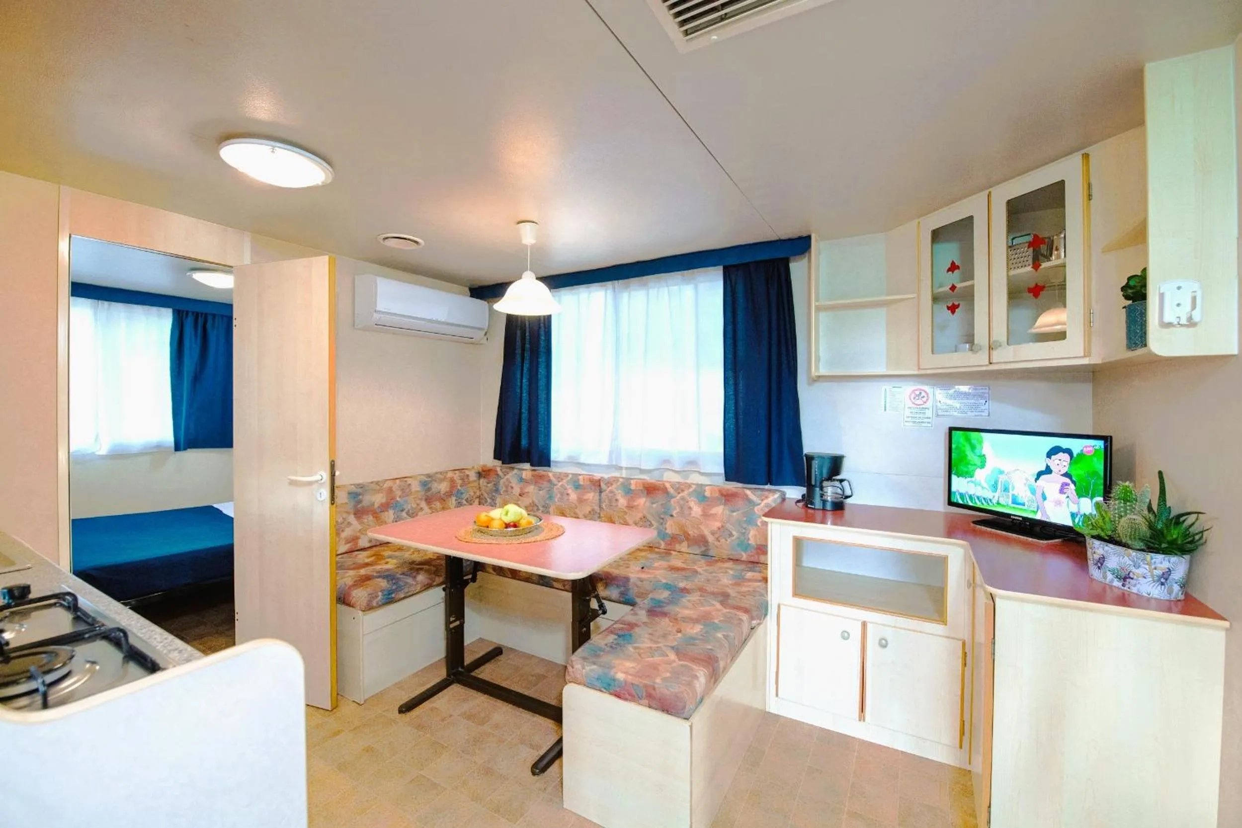 Kitchen or kitchenette in Camping Village Punta Navaccia