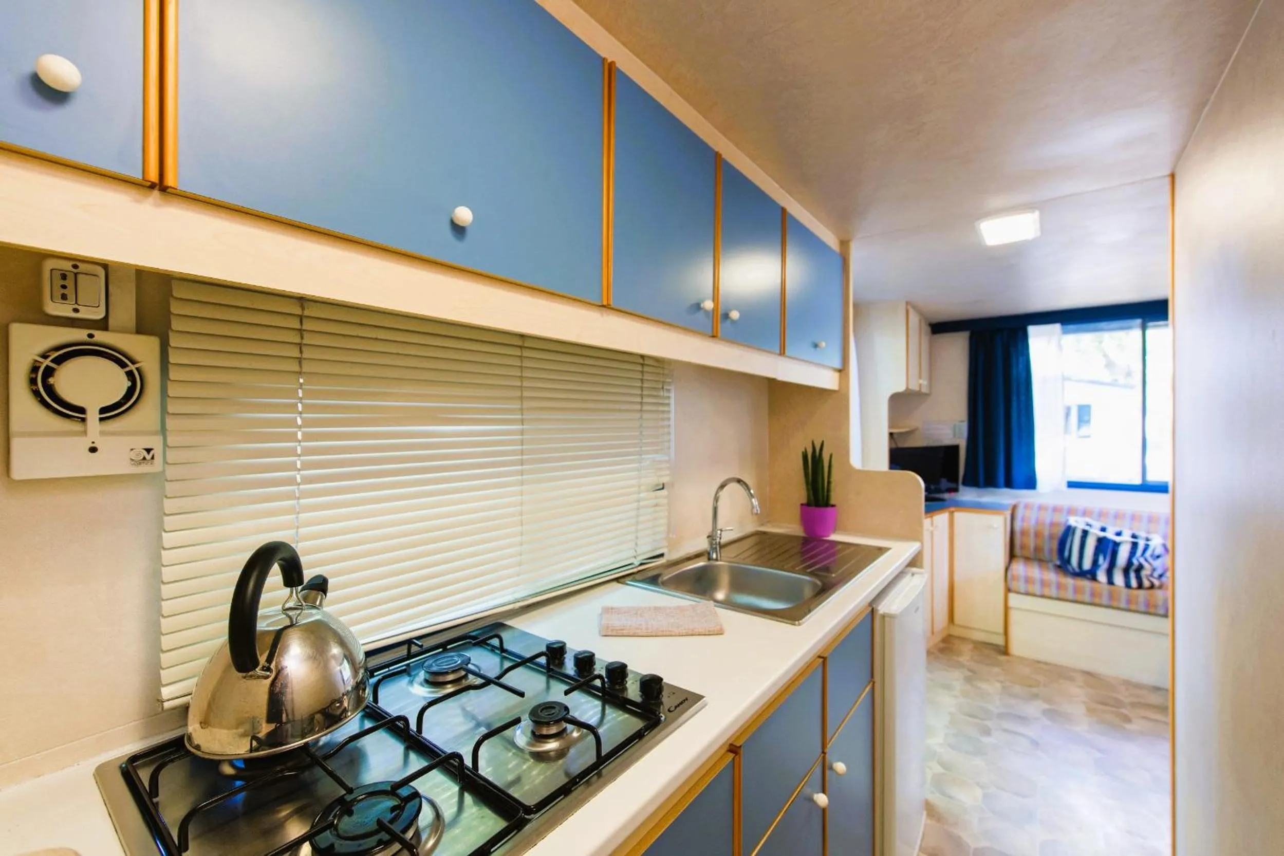 Kitchen or kitchenette in Camping Village Punta Navaccia