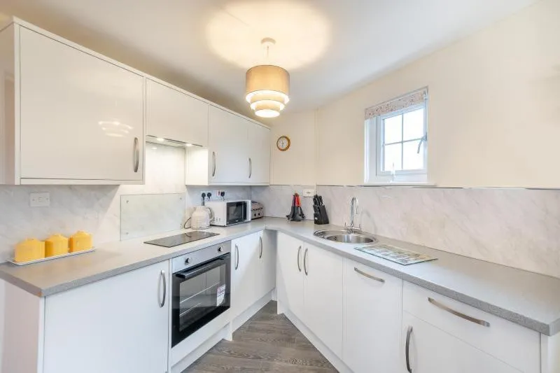 Kitchen or kitchenette in Hunston Mill Self Catering Dog Stay For Free