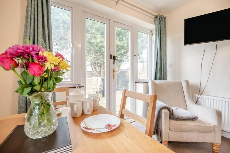 Dining area in Hunston Mill Self Catering Dog Stay For Free